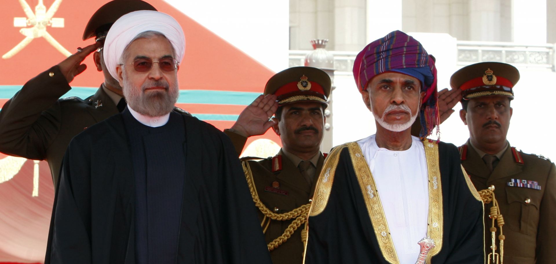Omani leader Sultan Qaboos bin Said (R) and Iranian President Hassan Rouhani (L) in Muscat on March 12.