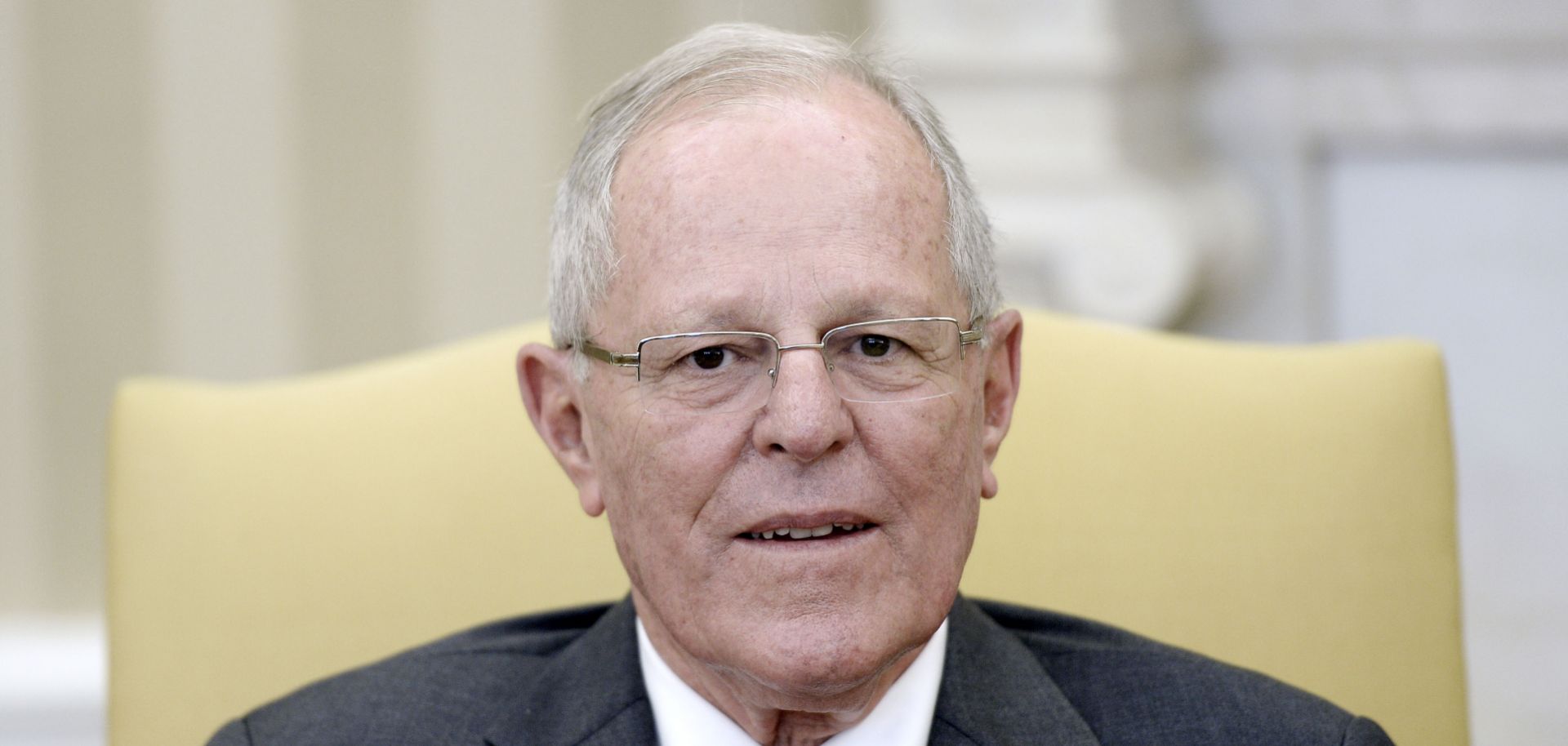 Peruvian President Pedro Pablo Kuczynski sits in the Oval Office of the White House during a meeting with U.S. President Donald Trump in February 2017.