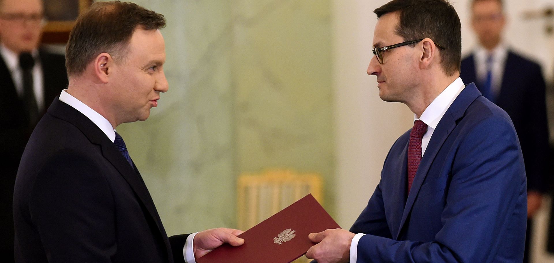 Polish President Andrzej Duda (L) swears in Prime Minister Mateusz Morawiecki on Dec. 8, 2017.