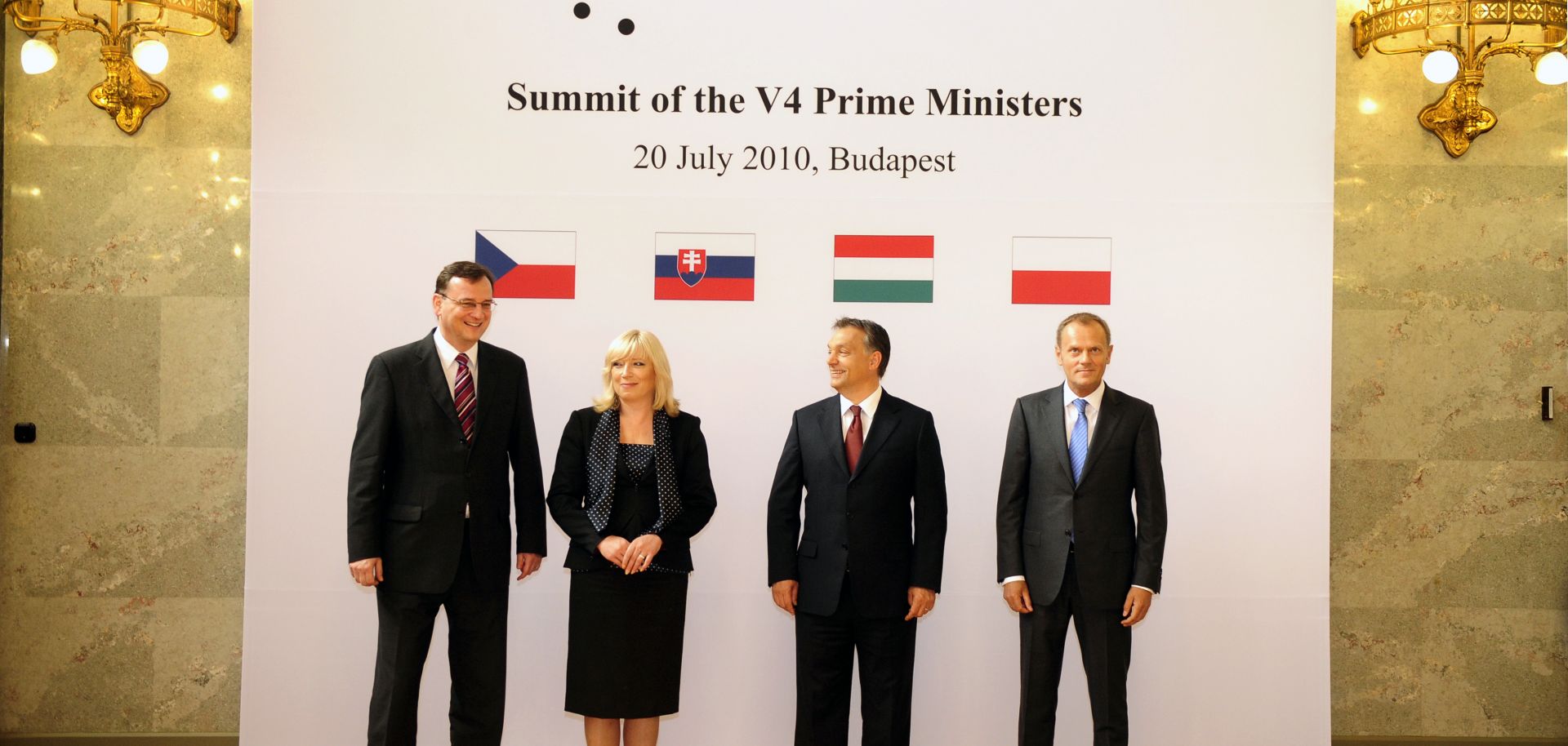 Prime Ministers of the Visegrad Four countries stand for a portrait.