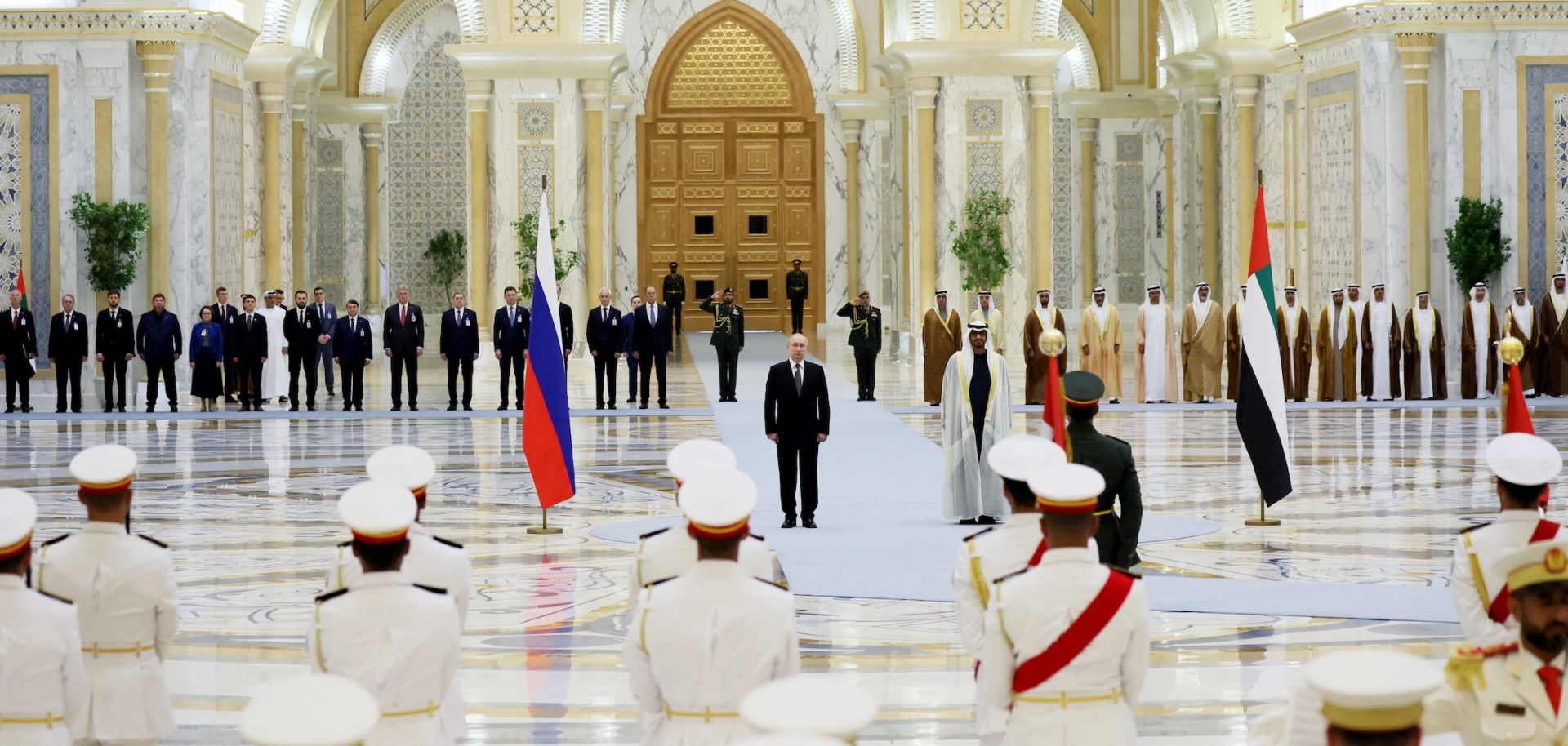Russian President Vladimir Putin and UAE leader Sheikh Mohammed bin Zayed Al Nahyan attend a welcoming ceremony ahead of their talks in Abu Dhabi on Dec. 6, 2023.