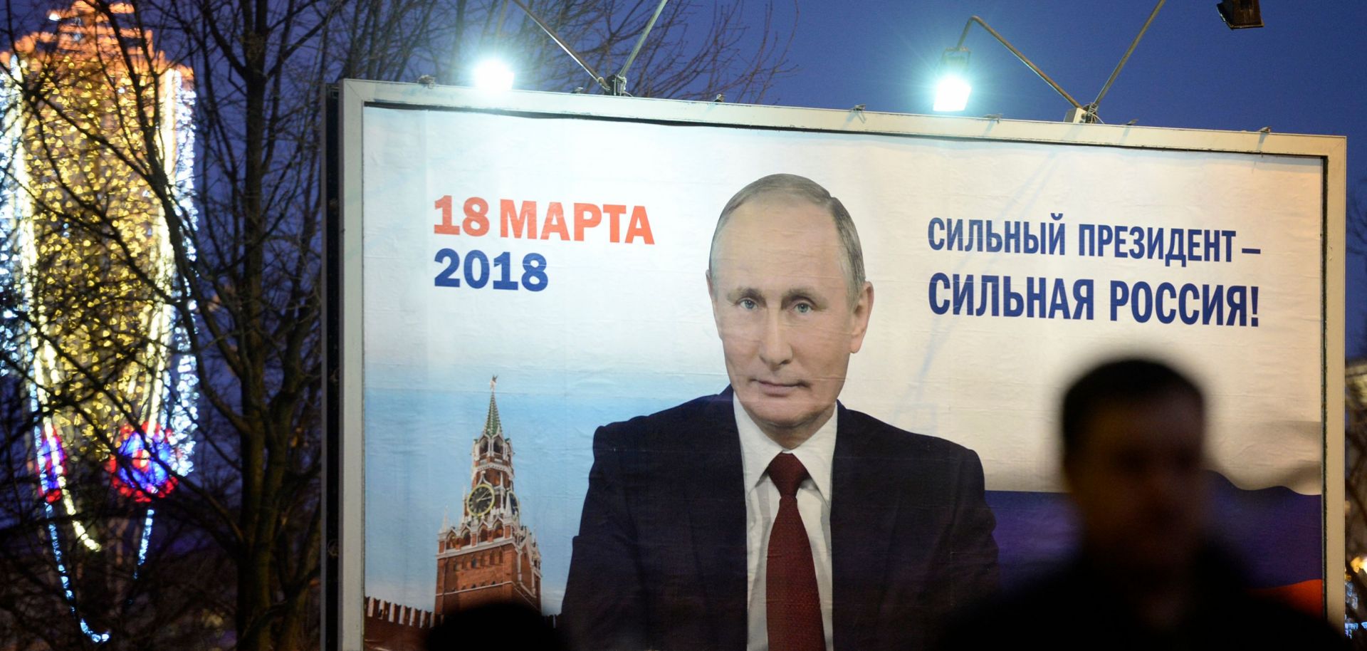 A billboard with an image of Russian President Vladimir Putin reads "Strong president - Strong Russia" in St. Petersburg on Jan. 12, 2018. 