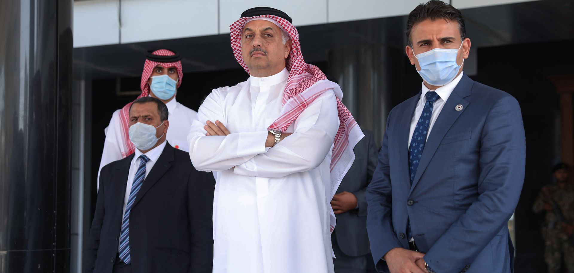 Qatar’s defense minister (center) waits for the arrival of his Turkish counterpart to meet with the prime minister of Libya’s U.N.-recognised Government of National Accord (GNA) in Tripoli on Aug. 17, 2020. 