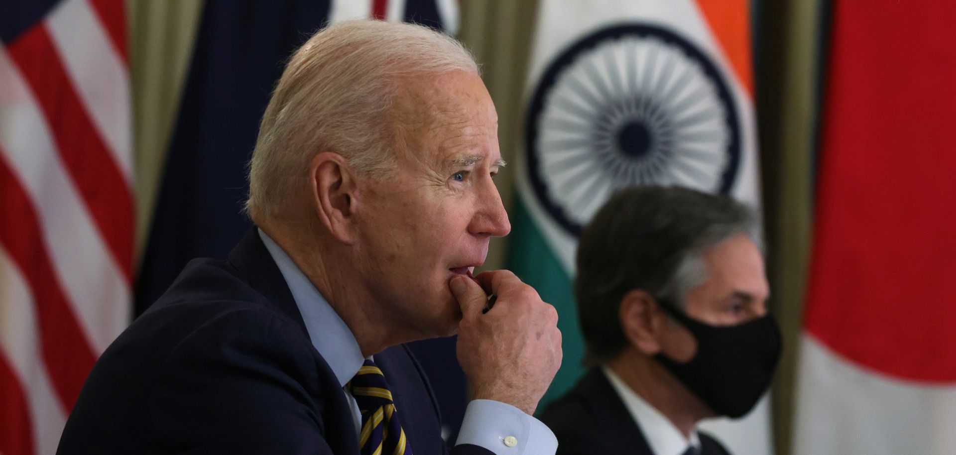 U.S. President Joe Biden (L) and U.S. Secretary of State Antony Blinken in a virtual meeting with other leaders of the QUAD on March 12, 2021, at the White House.