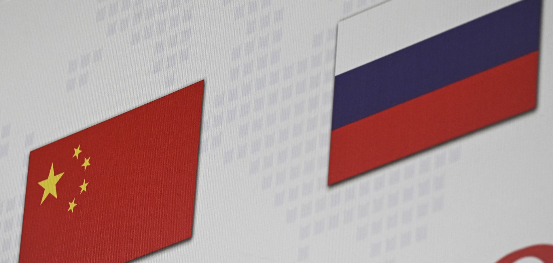 The Chinese and Russian national flags (R) on March 22, 2022, in Beijing.