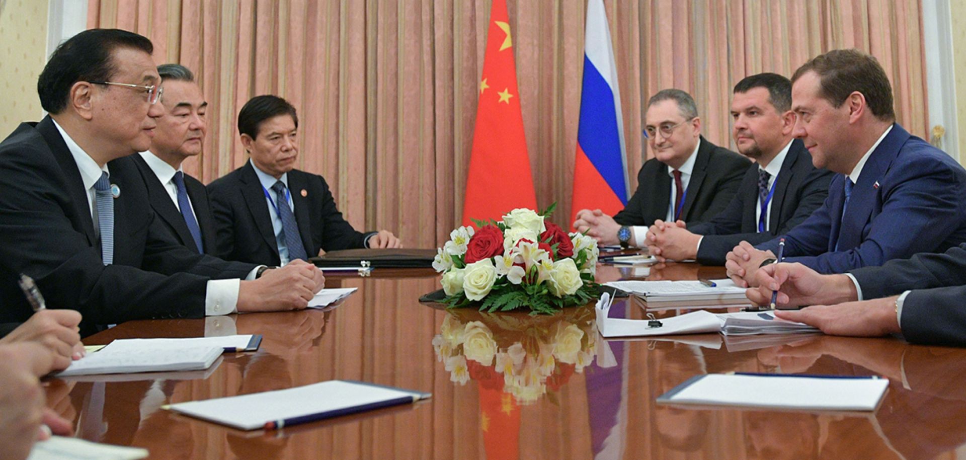 Russian Prime Minister Dmitri Medvedev and Chinese Premier Li Keqiang meet on Oct. 12 during a gathering of the Shanghai Cooperation Organization in Dushanbe, Tajikistan.