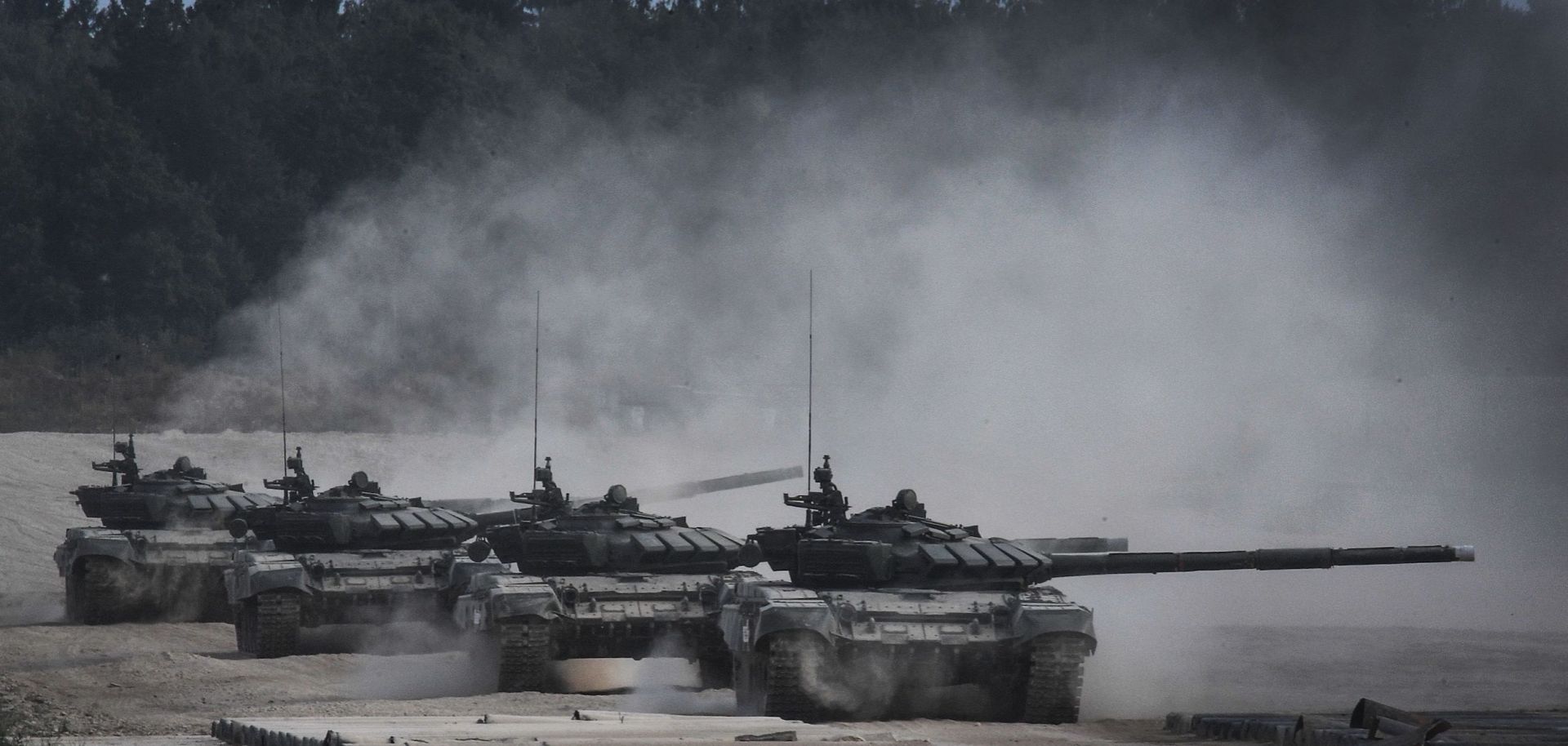 Russian tanks line up to fire during the first day of the Army 2017 International Military Technical Forum.