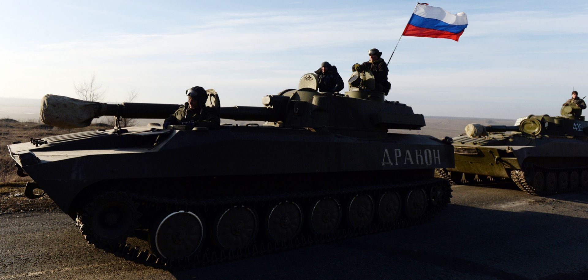 Ukranian separatists fly a Russian flag