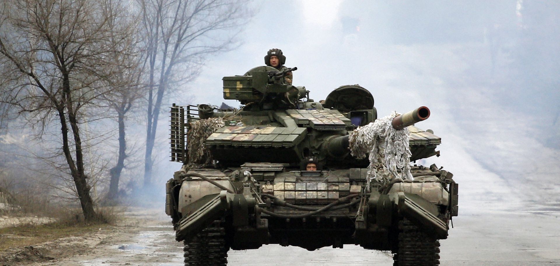 Ukrainian tanks approach the front lines with Russian forces Feb. 25, 2022, in the Lugansk region of Ukraine.