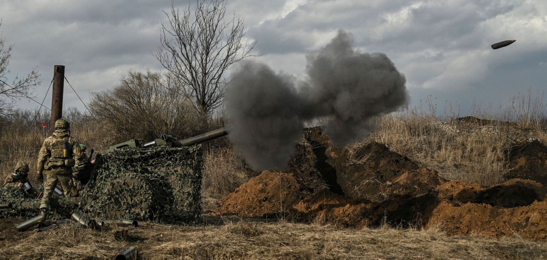 Ukrainian servicemen fire with a 105mm howitzer toward Russian positions near the city of Bakhmut on March 8, 2023, amid the Russian invasion of Ukraine.