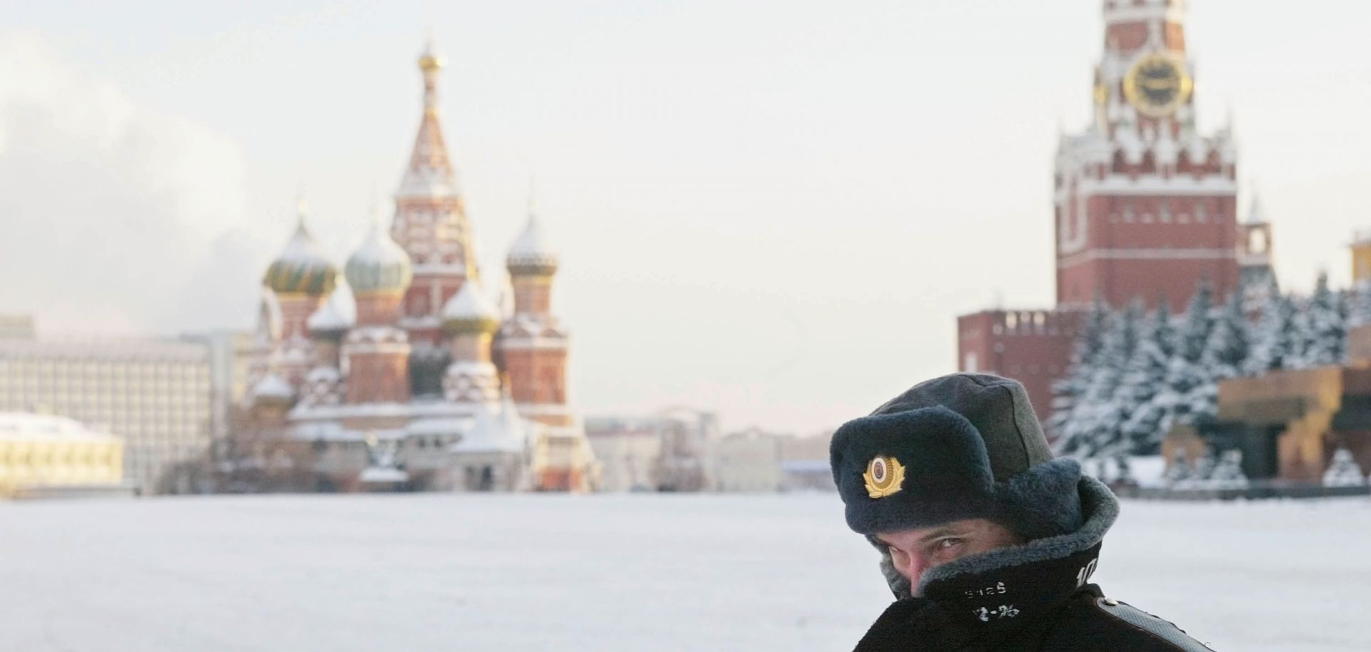 A Russian police officer patrols Red Square in the bitter cold of Russian winter. 