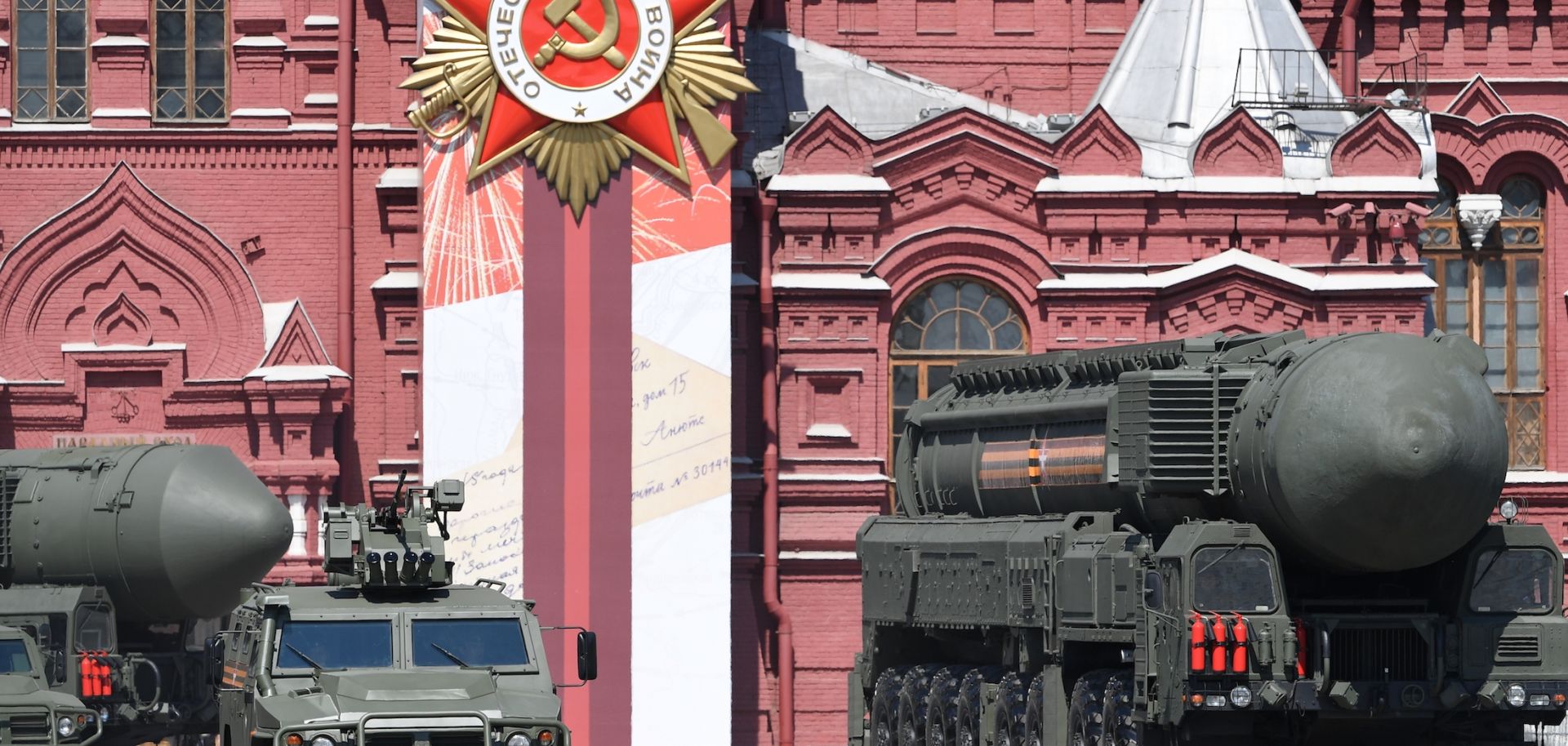 An intercontinental ballistic missile launcher and an armored vehicle are displayed during a military parade in Moscow, Russia, on June 24, 2020, to commemorate the 75th anniversary of Russia’s victory in World War II.