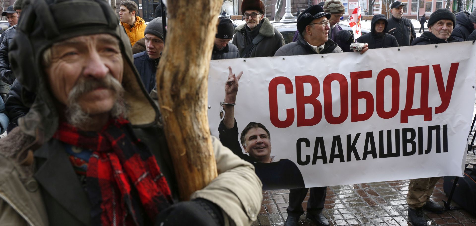 Supporters of Mikhail Saakashvili rally in Kiev, Ukraine, on Dec. 11. The former Georgian president, now a Ukrainian opposition leader, was detained earlier in the day. The banner reads 'Freedom for Saakashvili.'