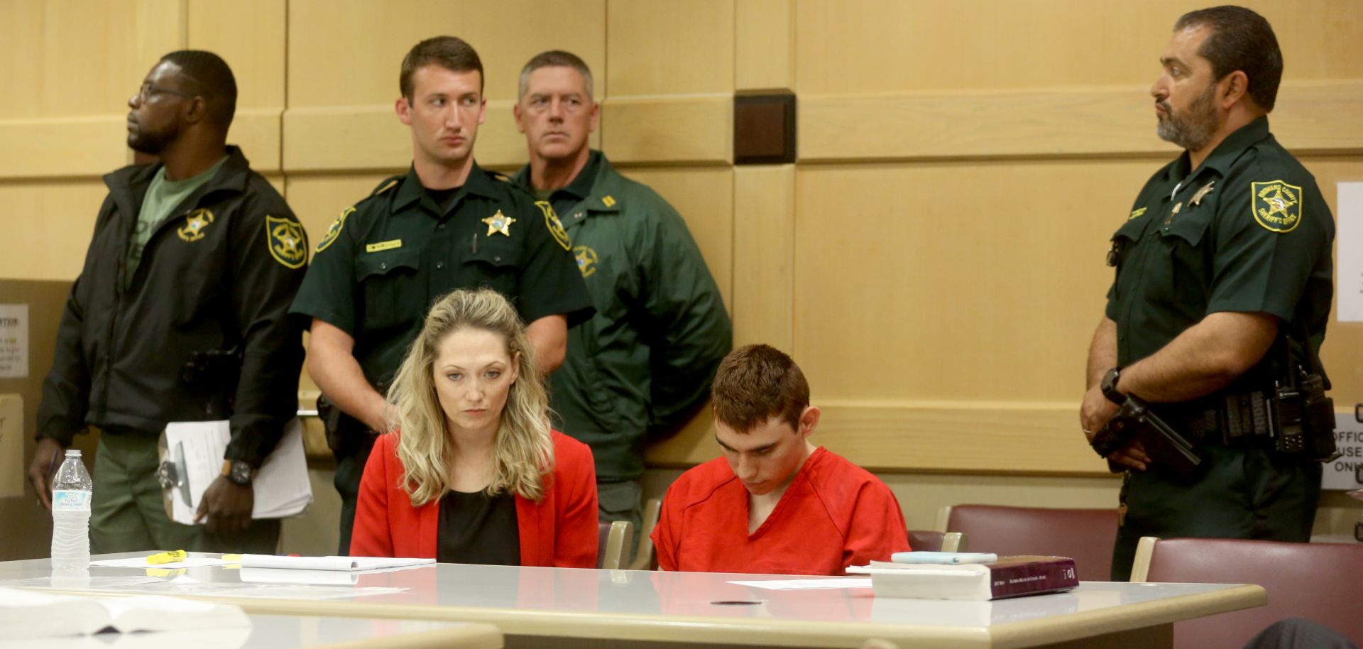 Nikolas Cruz sits in court during a hearing. He is charged with killing 17 people in a school shooting on Feb. 14.