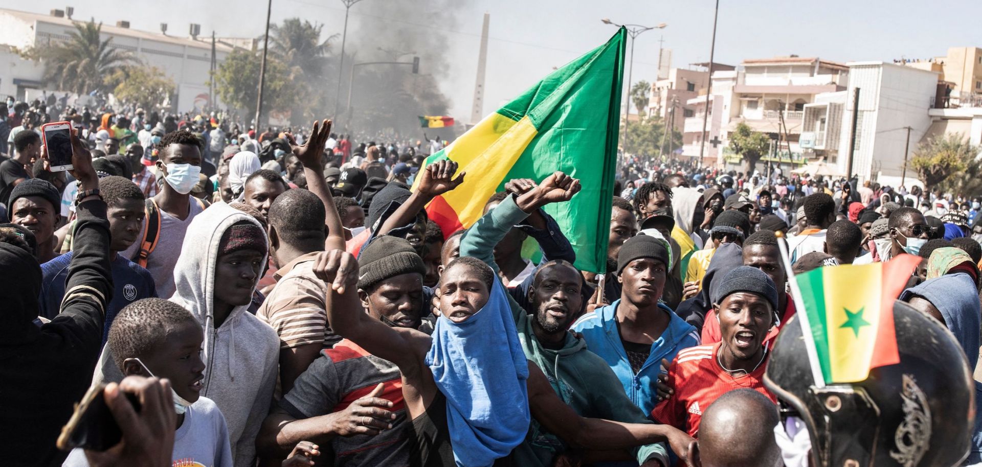 Protesters gather in the Senegalese capital of Dakar on March 8, 2021, after the country's opposition leader Ousmane Sonko was charged with rape. 