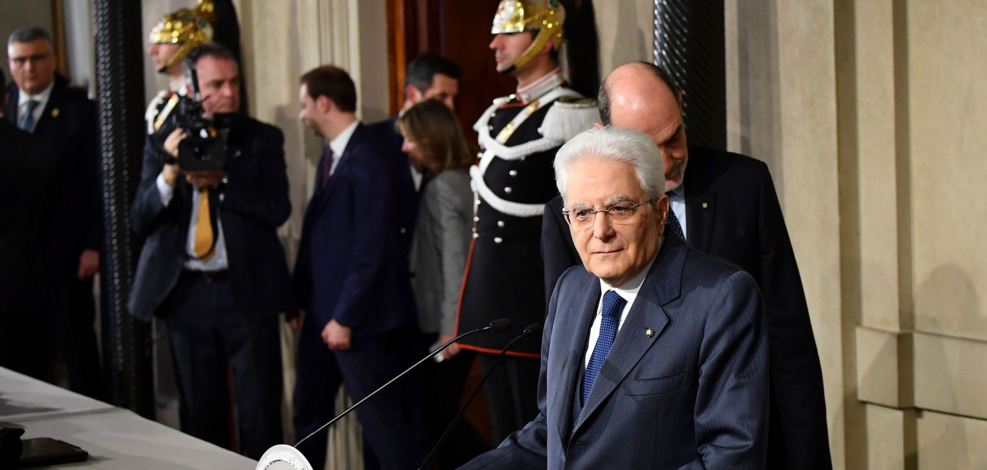 Italian President Sergio Mattarella delivers remarks to journalists as he and the leaders of Italy's political parties negotiate a path toward forming a government.