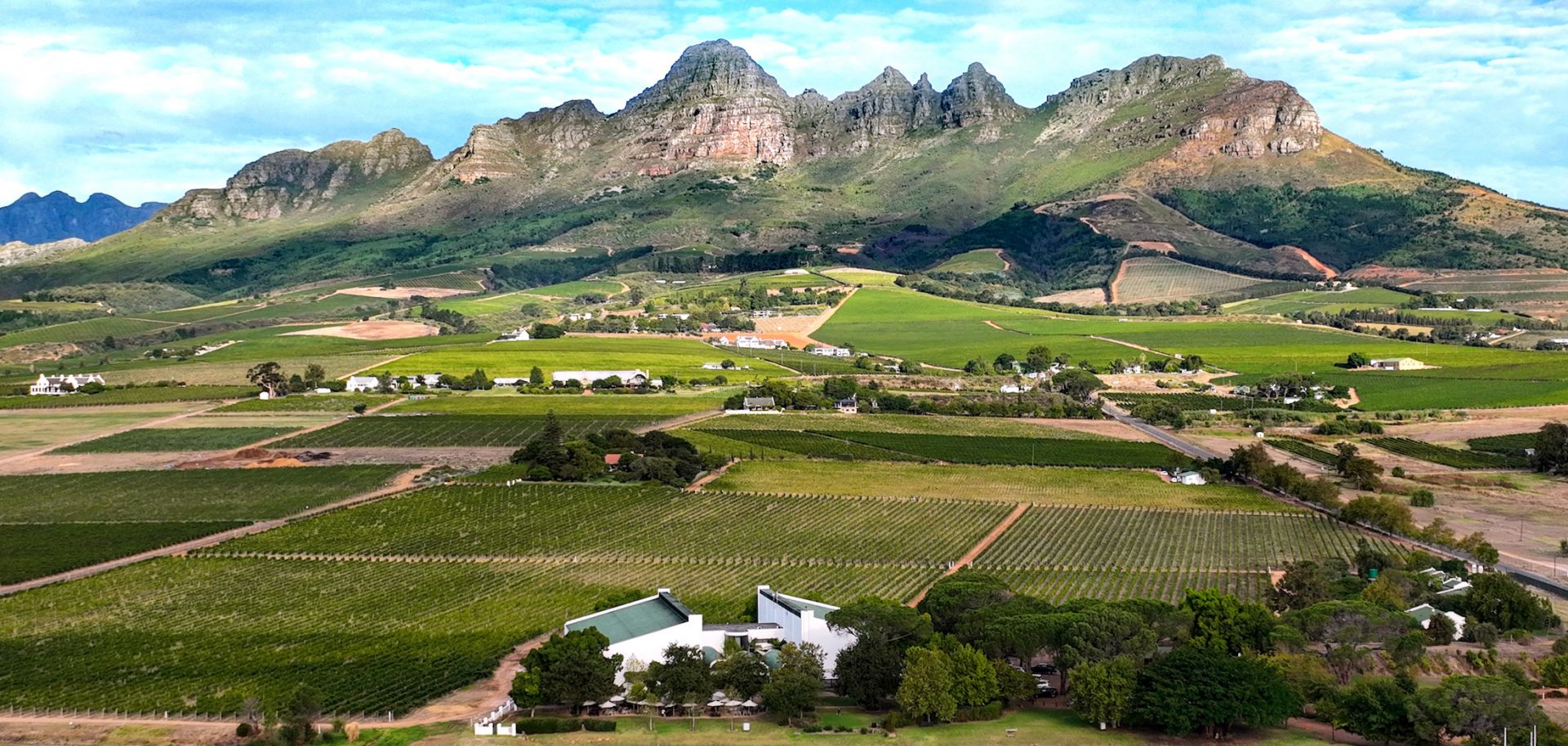 An evening aerial view of the Eikendal Vineyards winery estate on the slopes of the Helderberg Mountain during harvest season on March 15 in Western Cape province's wine-producing town of Stellenbosch, South Africa.