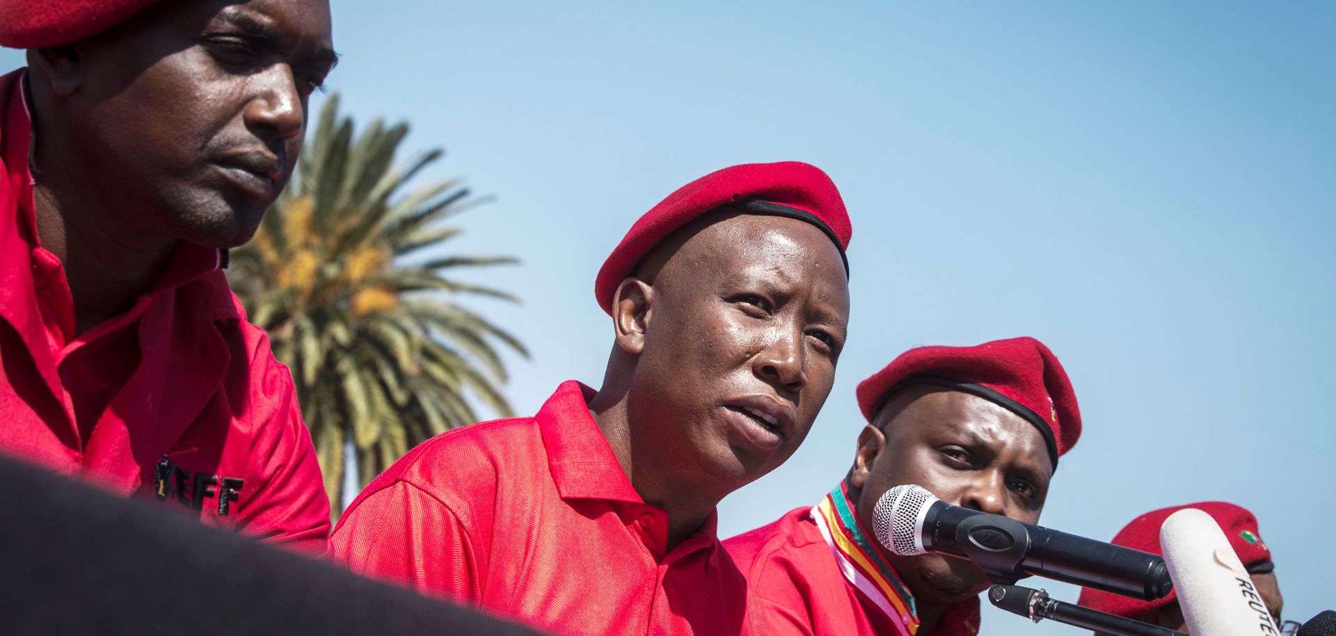Julius Malema (C) announces on Aug. 17 that his Economic Freedom Fighters party will not enter into any governing coalitions after municipal elections in several South African cities left no party with a majority.