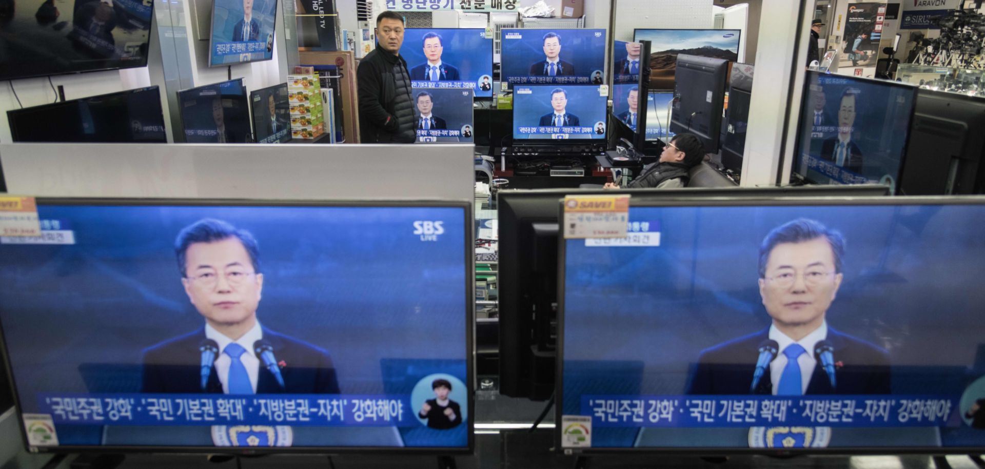 Televisions at a mall in Seoul show South Korean President Moon Jae In speaking on Jan. 10, 2018, the day after North and South Korea held face-to-face talks for the first time in more than two years.