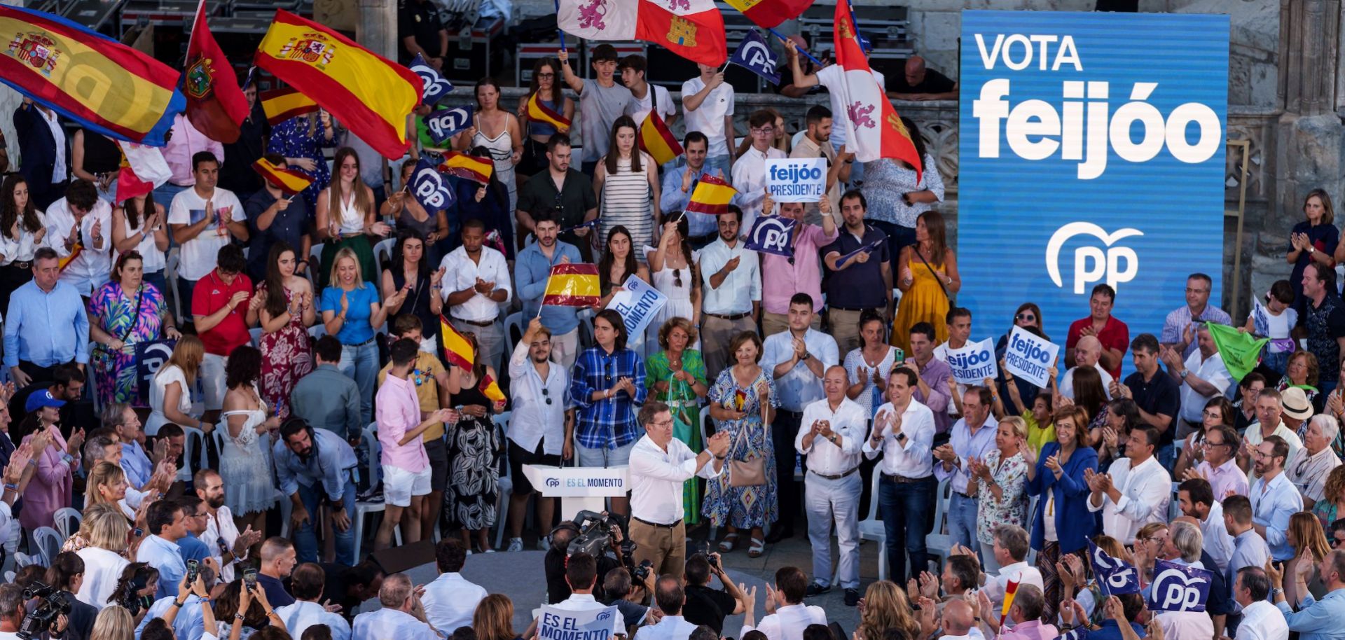 Alberto Nunez Feijoo (center, white shirt), the leader of Spain's right-wing People's Party, gestures to supporters at a campaign rally in Burgos, Spain, on July 13, 2023.
