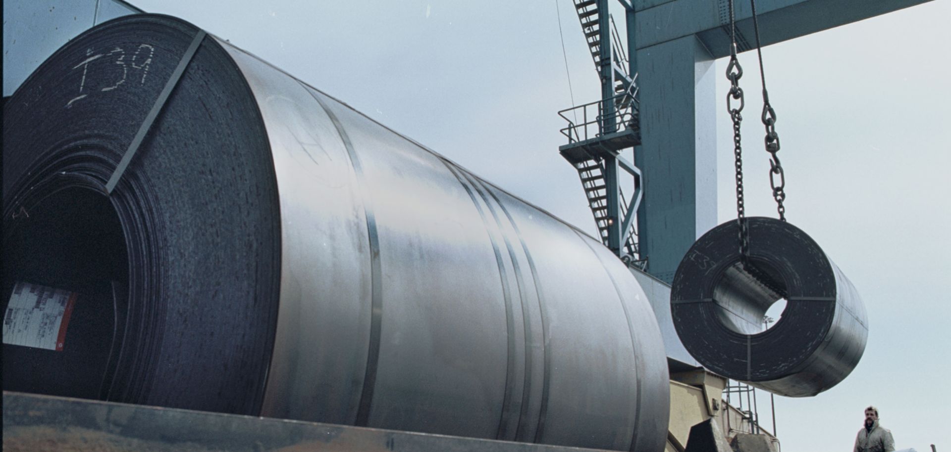 Workers load steel for transport from Holland to its final destination in Ohio. 