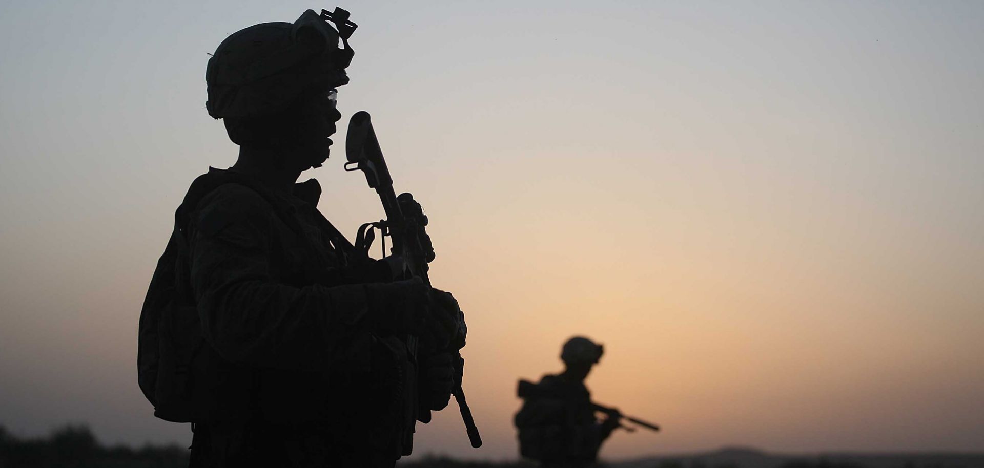 U.S. Marines with the 2nd Marine Expeditionary Brigade, RCT 2nd Battalion 8th Marines Echo Co. step off in the early morning during an operation to push out Taliban fighters on July 18, 2009 in Herati, Afghanistan . The Marines met no resistance during the operatoin. The Marines are part of Operation Khanjari which was launched to take areas in the Southern Helmand Province that Taliban fighters are using as a resupply route and to help the local Afghan population prepare for the upcoming presidential elect