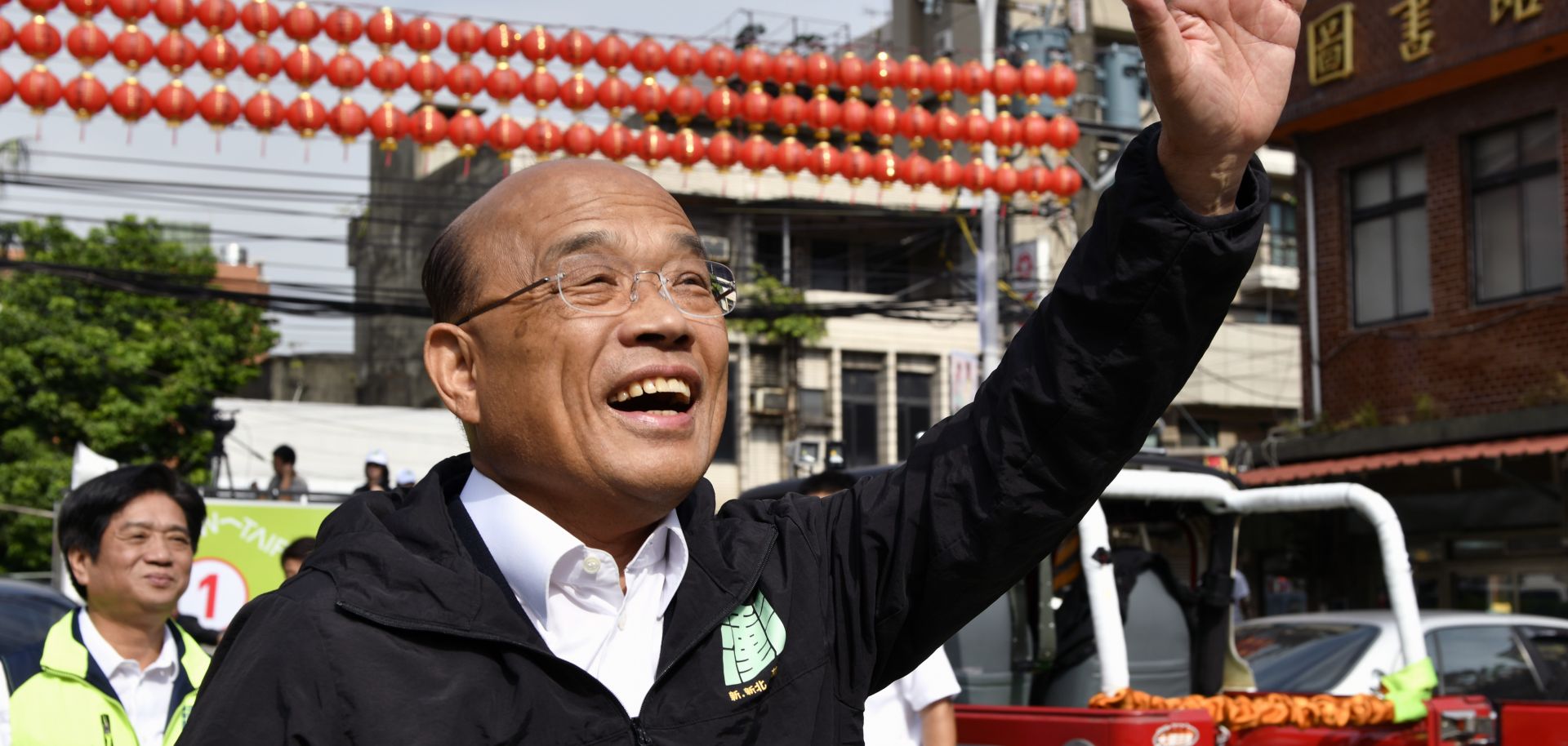 Su Tseng-chang, New Taipei mayor candidate from the ruling Democratic Progressive Party (DPP), waving during the elections campaign.