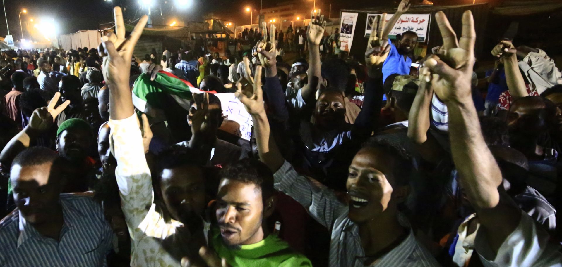 Sudanese celebrate an agreement on a civilian-majority legislative body following the removal of authoritarian leader Omar al Bashir in April 2019. The body will be in power for the next three years, after which, elections will be held to allow citizens to decide on its next composition.