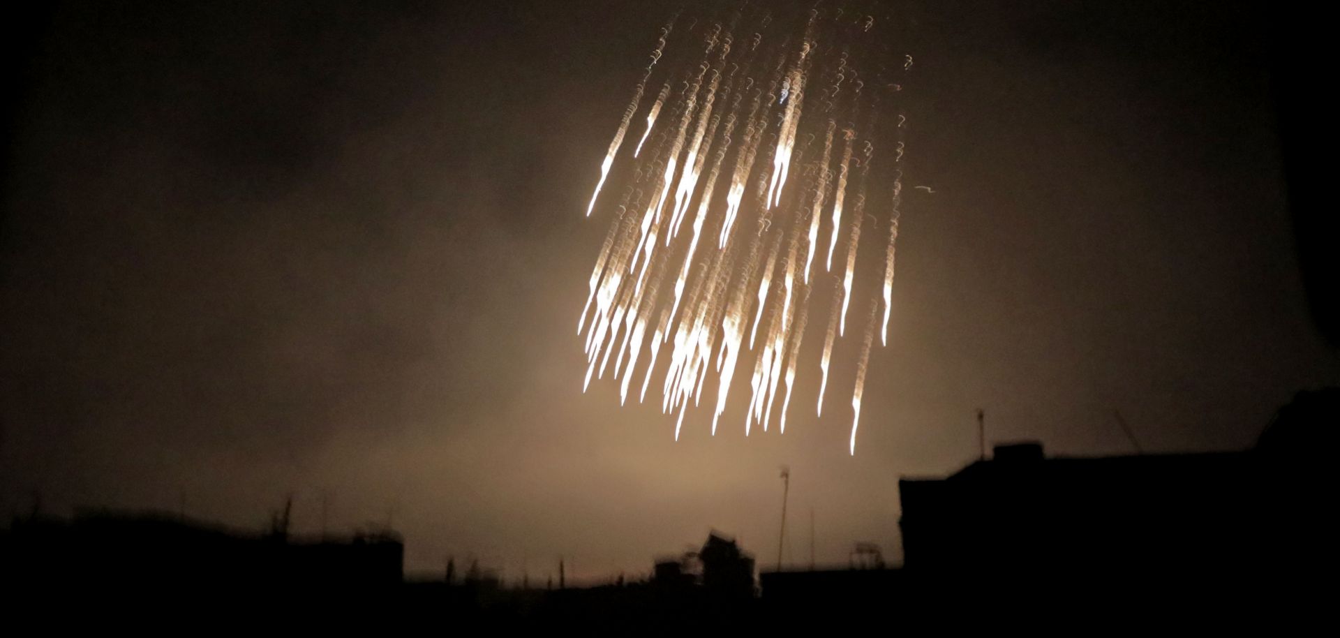 A photograph taken during a March 23, 2018, bombardment in the rebel-held town of Douma, in eastern Ghouta outside Damascus.