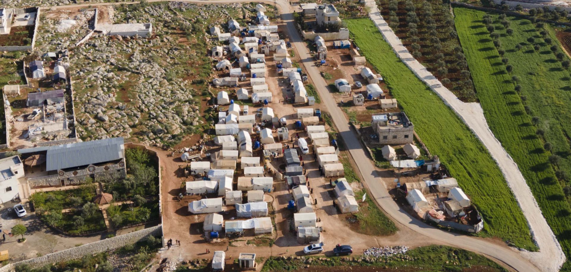 An ariel view shows a camp in Idlib for people displaced by Syria's ongoing civil war on April 13, 2021. 