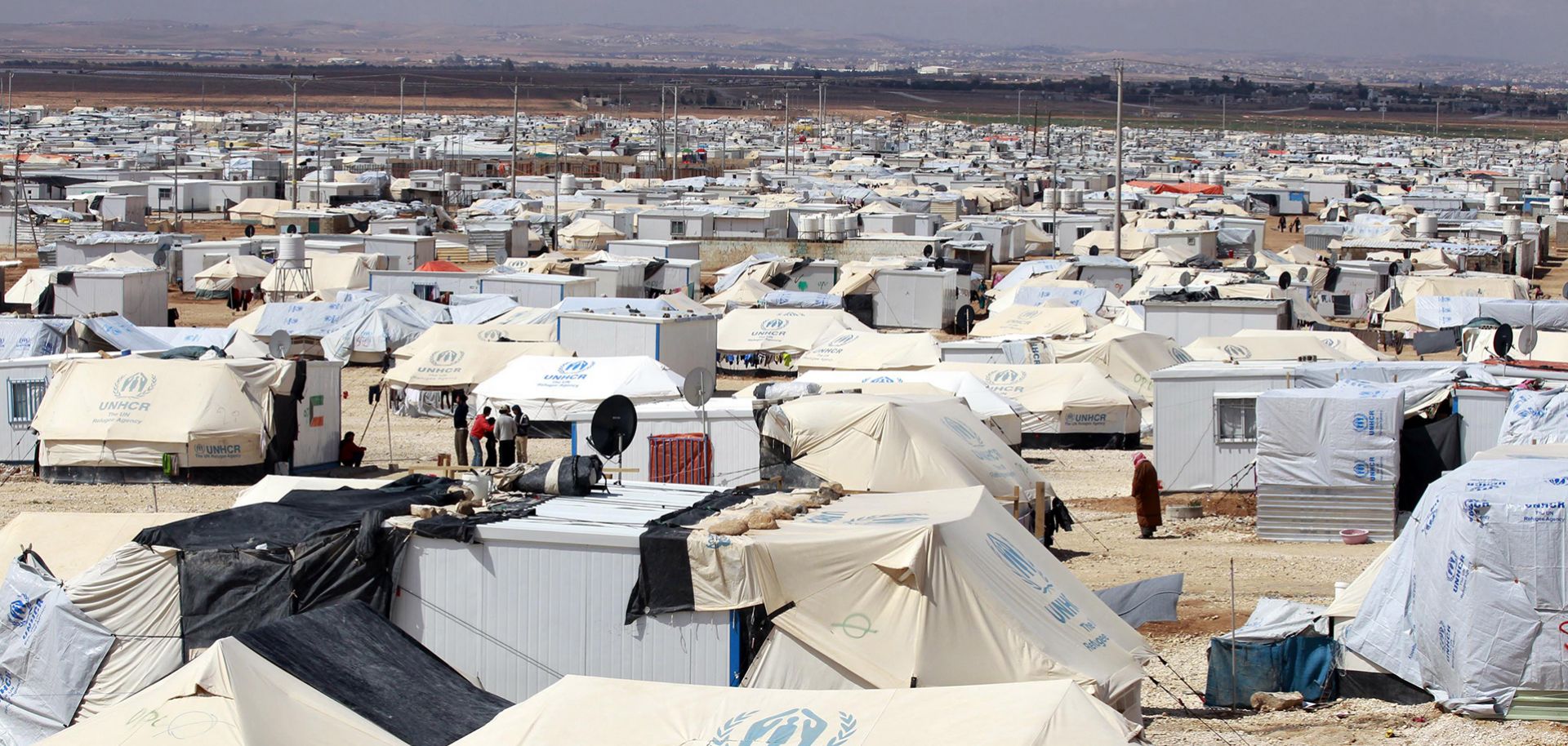 A picture taken on March 15, 2014 shows part of the seven-square-kilometre (2.8-square-mile) Zaatari refugee camp in northern Jordan near the border with Syria which provides shelter to around 100,000 Syrian refugees. Syrian refugees in the sprawling desert camp in Jordan fear that President Bashar al-Assad's likely re-election this year will leave their dream of a return home as distant as ever. The brutal war in Syria between the regime and its foes shows no sign of abating and has killed at least 146,000