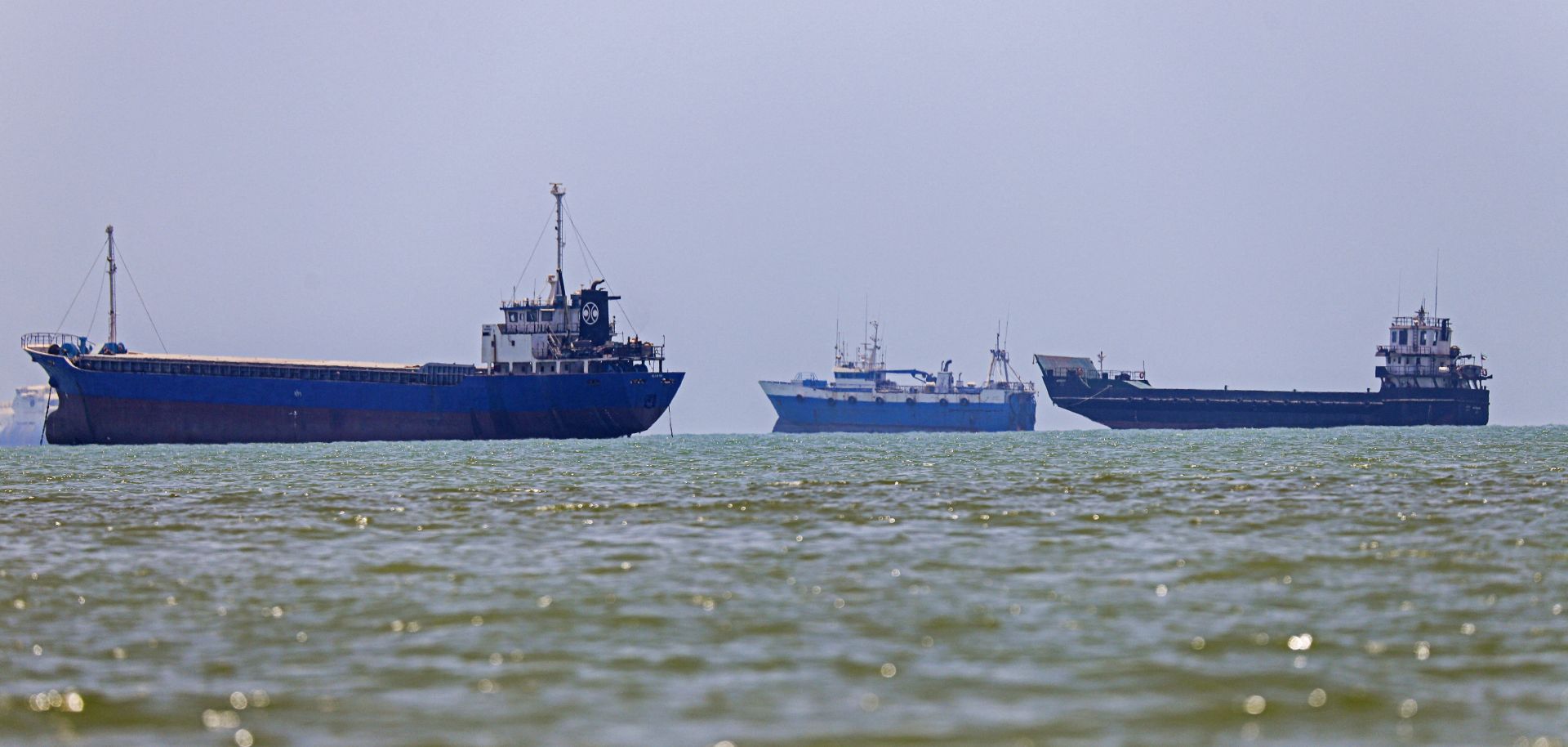 Vessels are seen anchored along the Strait of Hormuz on June 18, 2026. 