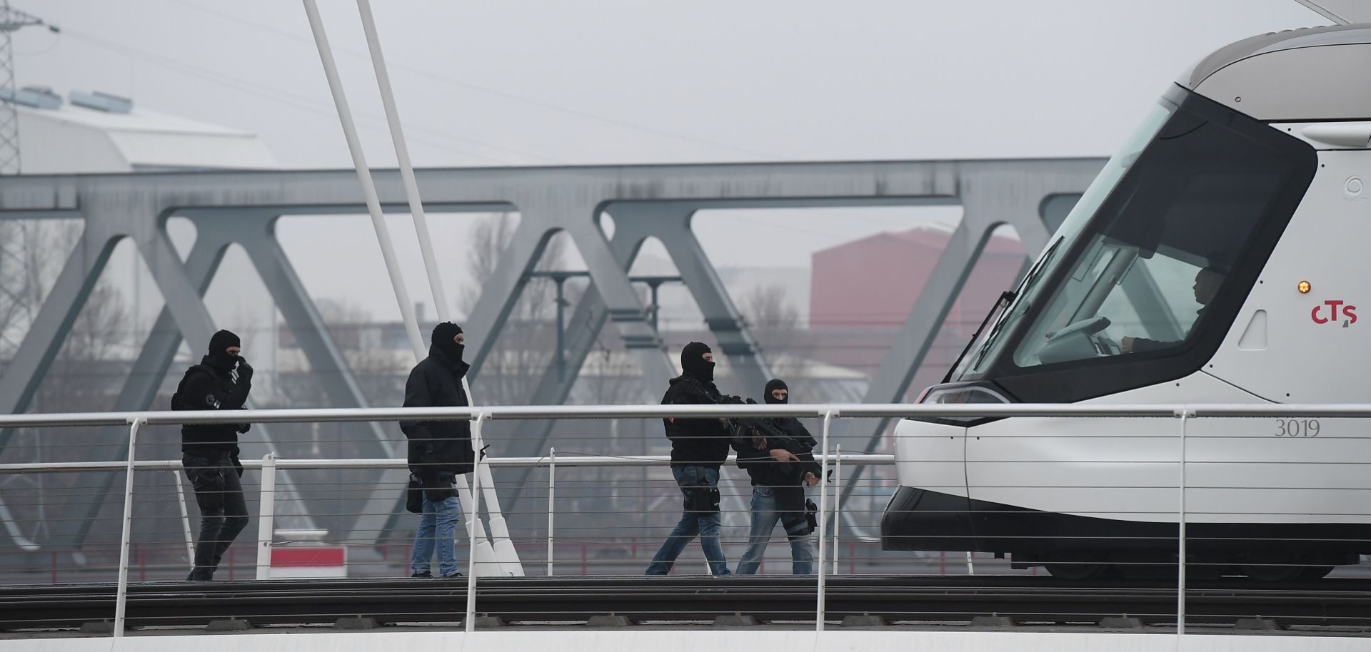 Members of the French police Research and Intervention Brigade prepare to search a tram in Strasbourg on Dec. 12, 2018.