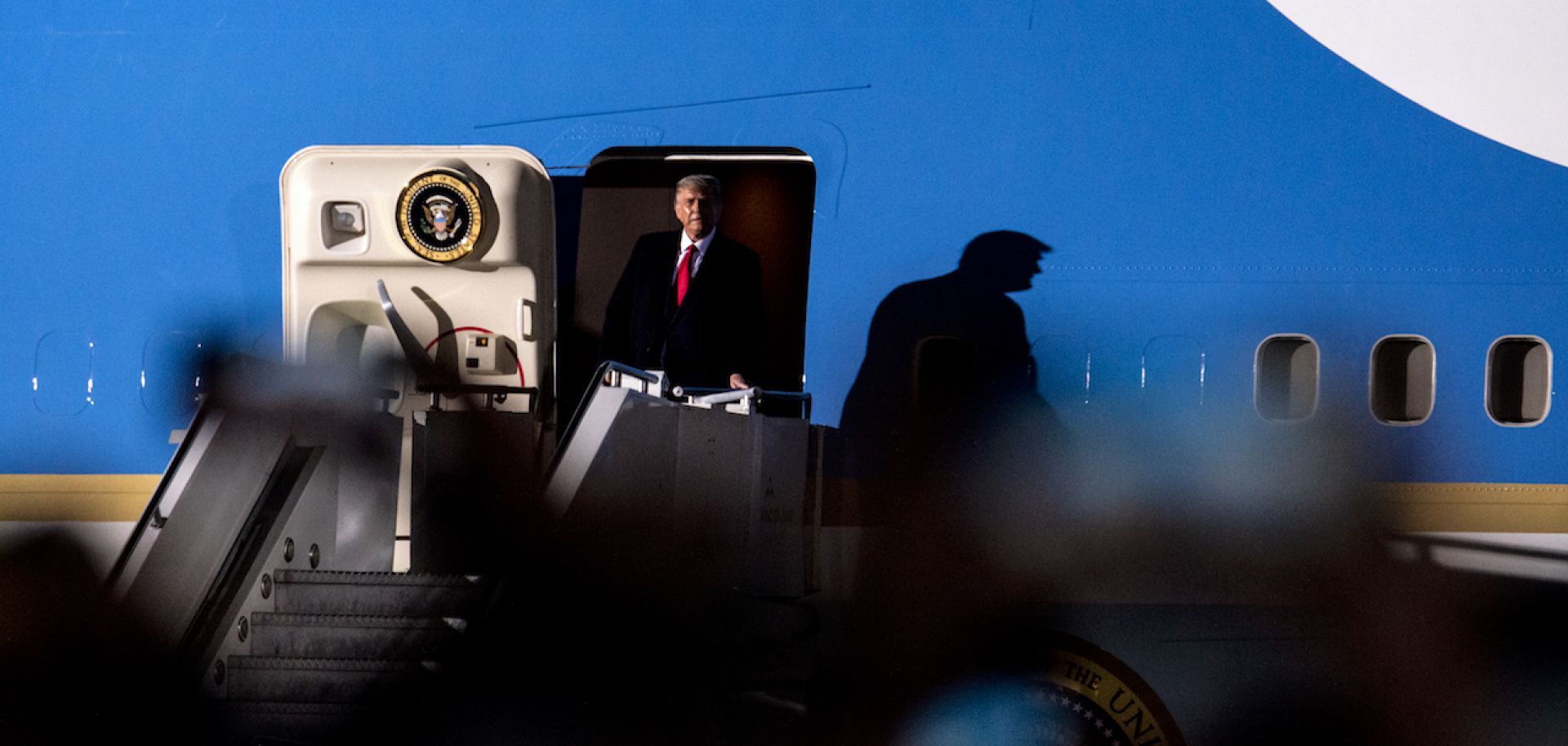 U.S. President Donald Trump exits Air Force One upon arriving in Duluth, Minnesota, for a campaign rally on Sept. 30, 2020. The following night, Trump tested positive for COVID-19. 