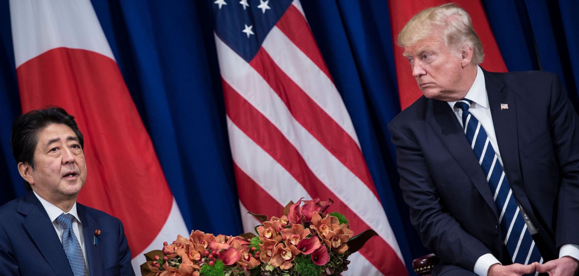 Japanese Prime Minister Shinzo Abe delivers remarks to the press at the United Nations in New York in September 2017 while seated beside U.S. President Donald Trump.