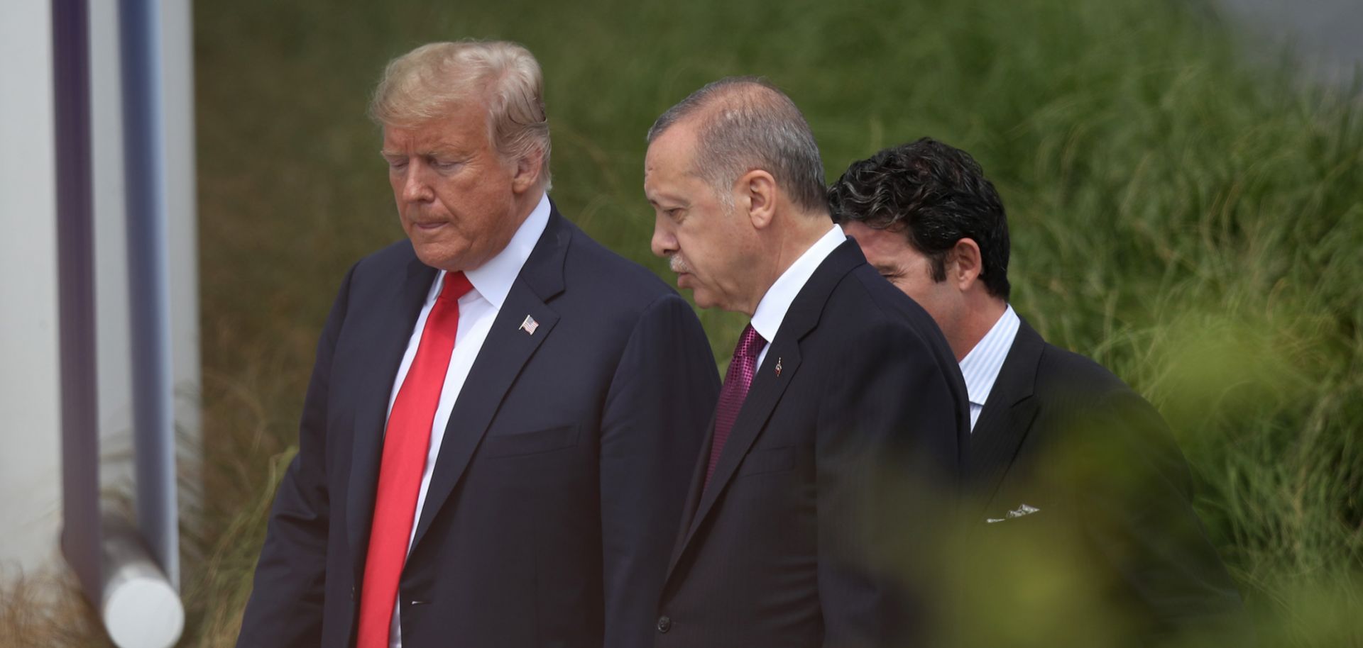 U.S. President Donald Trump and Turkish President Recep Tayyip Erdogan attend the opening ceremony at the 2018 NATO Summit at NATO headquarters on July 11, 2018, in Brussels.