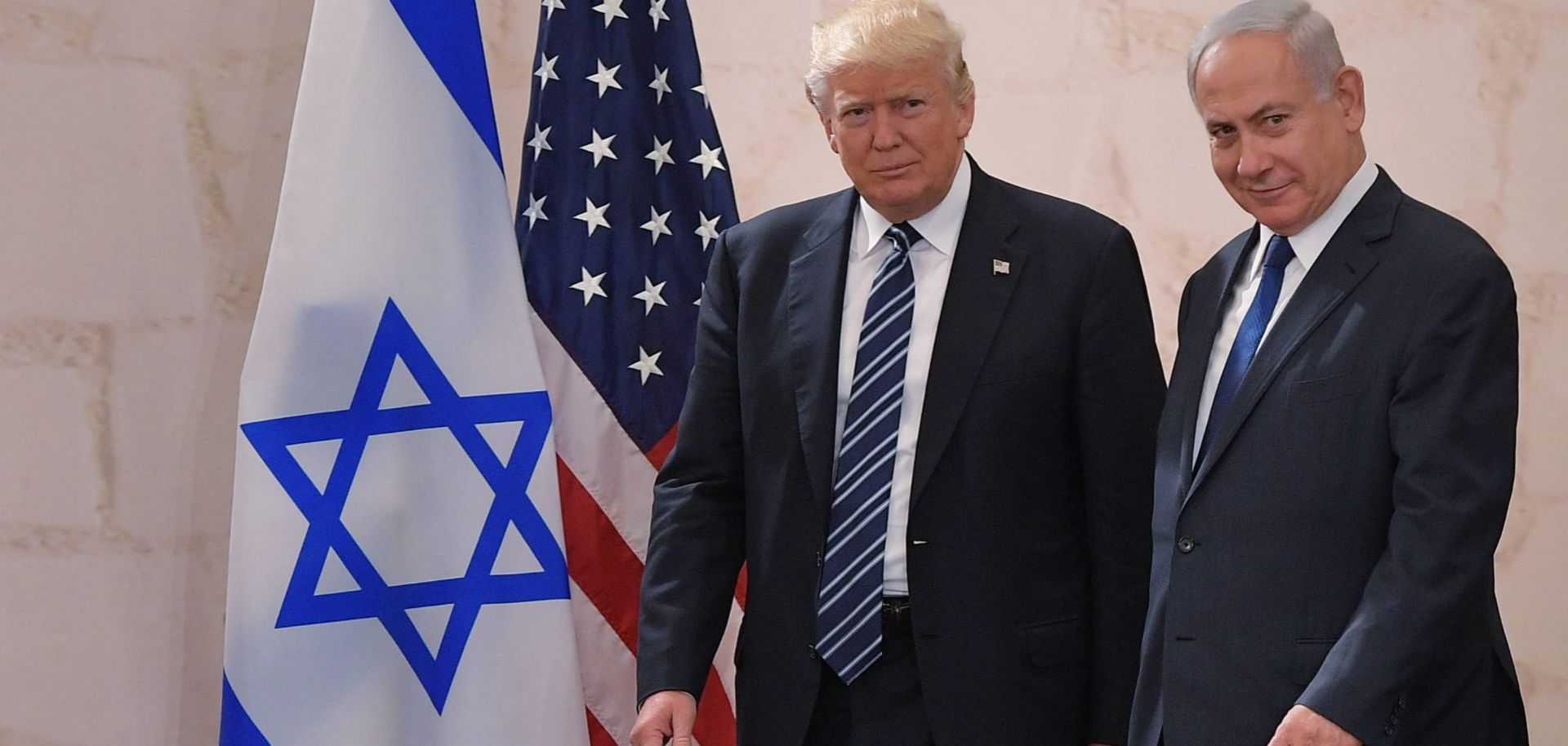 Israeli Prime Minister Benjamin Netanyahu (R) and U.S. President Donald Trump arrive at the Israel Museum in Jerusalem in May 2017.