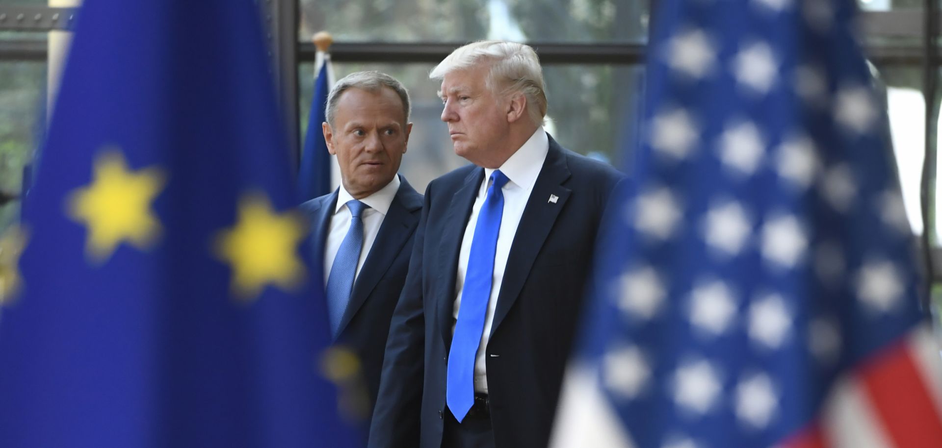Donald Tusk (L), president of the European Council, welcomes U.S. President Donald Trump to EU headquarters in Brussels for a NATO meeting in 2017.