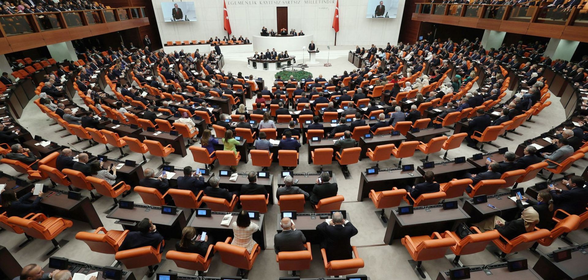 Turkish President Recep Tayyip Erdogan (C) on Oct. 1, 2022, addresses parliament in Ankara, Turkey.