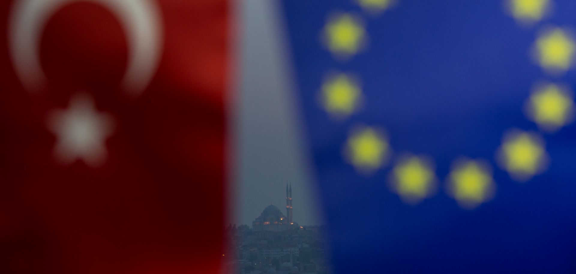 The flags of Turkey and the European Union fly over Istanbul.