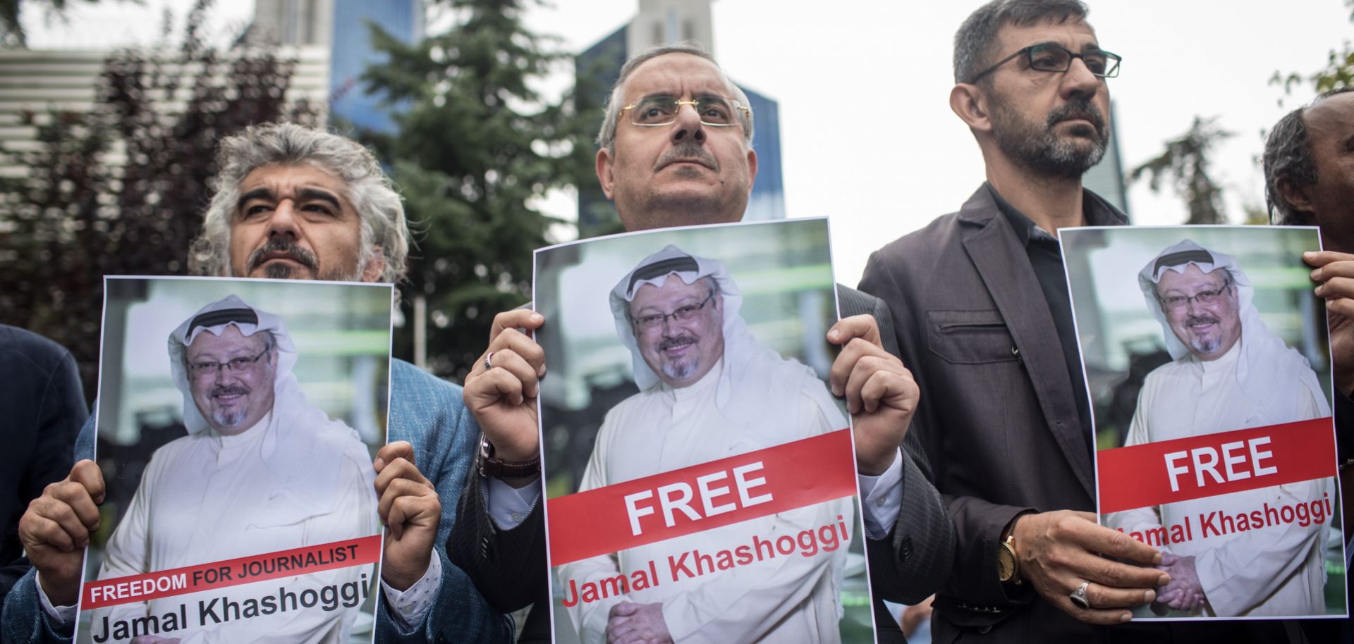 People hold posters of Saudi journalist Jamal Khashoggi during a protest organized by members of the Turkish-Arabic Media Association at the entrance to Saudi Arabia's consulate on Oct. 8 in Istanbul. 