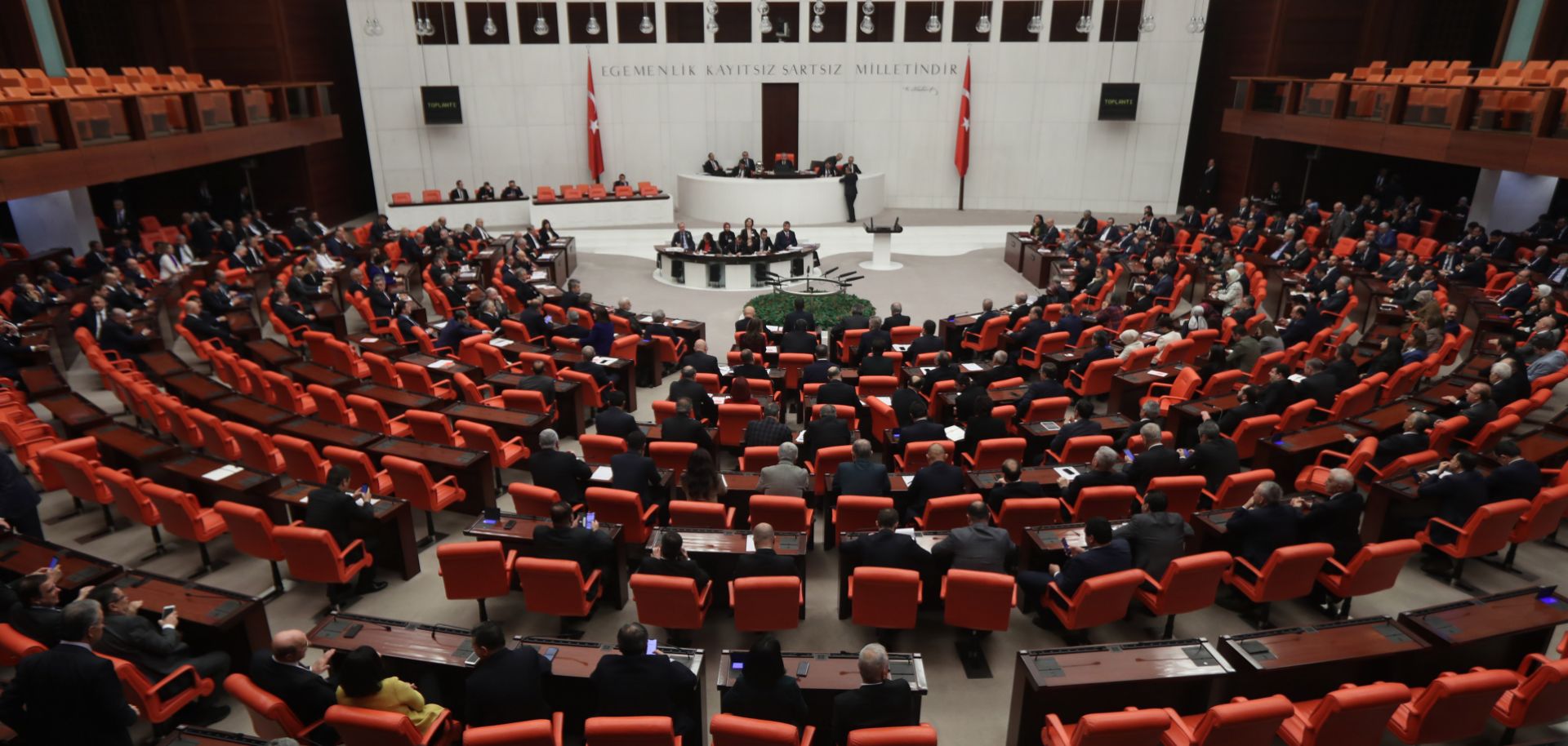 Members of Turkey's parliament pass legislation approving a deployment of Turkish troops to Libya on Jan. 2, 2020.