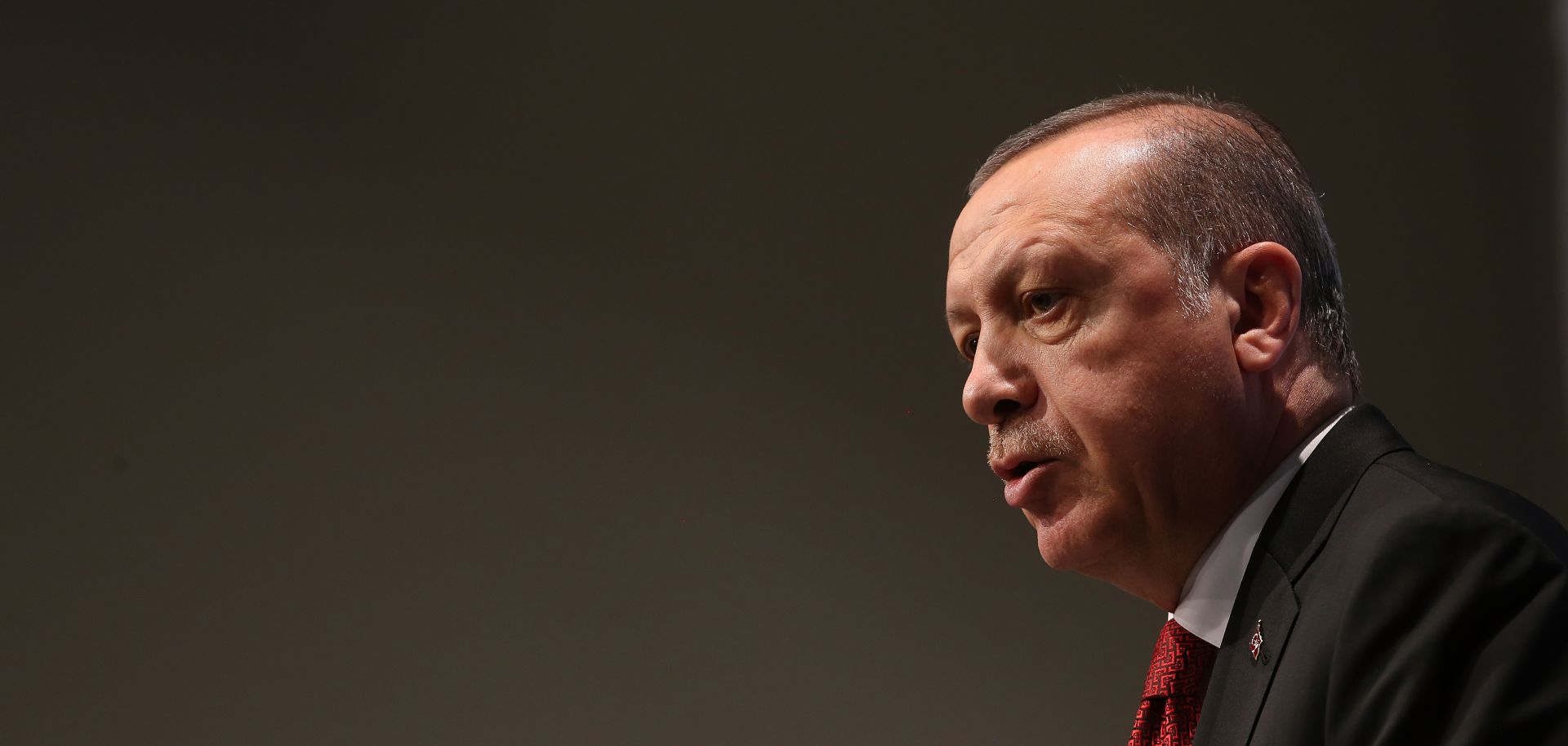 Turkish President Recep Tayyip Erdogan talks to the press as the 2017 G-20 summit winds down.