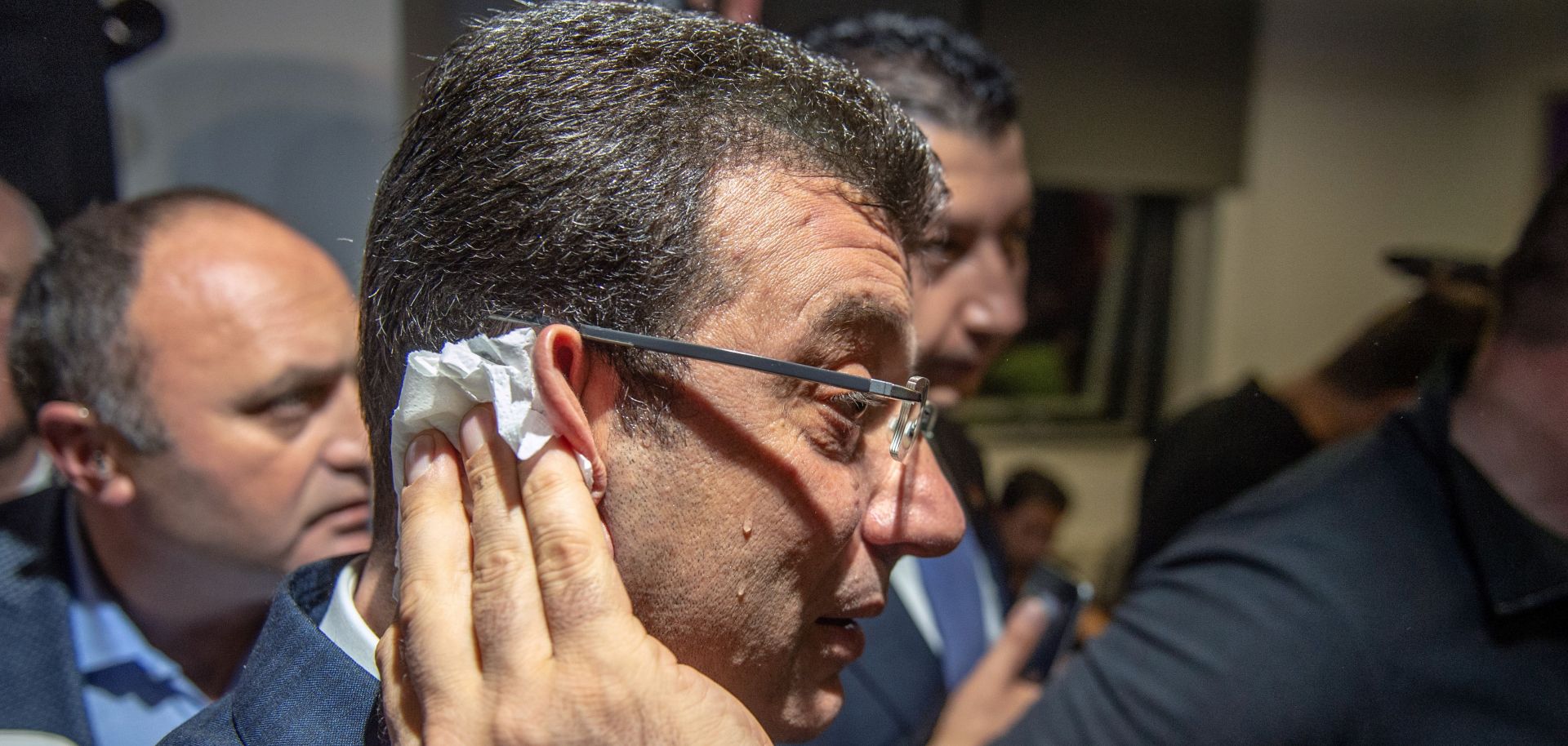 Sweat drips down the face of Ekrem Imamoglu during a news conference in Istanbul on April 9, 2019. On April 17, Imamoglu finally received the mandate to become mayor of Istanbul, more than two weeks after he won local elections.