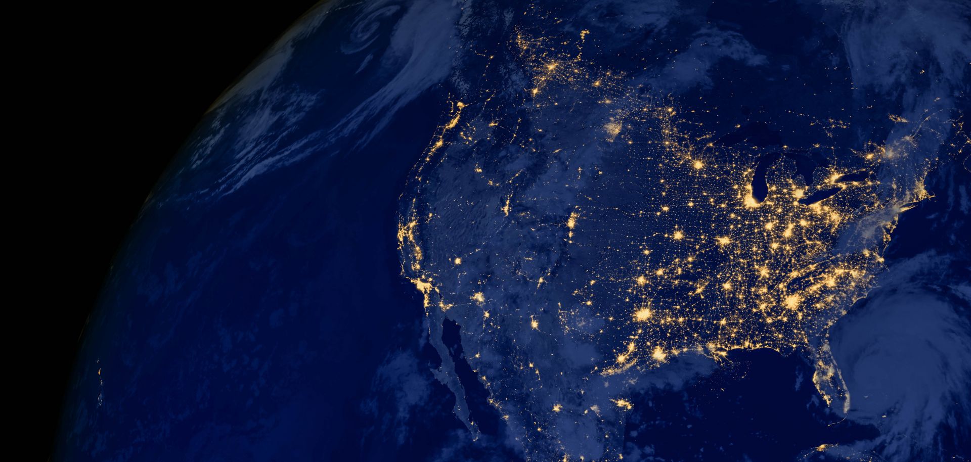 A satellite image of the United States at night.