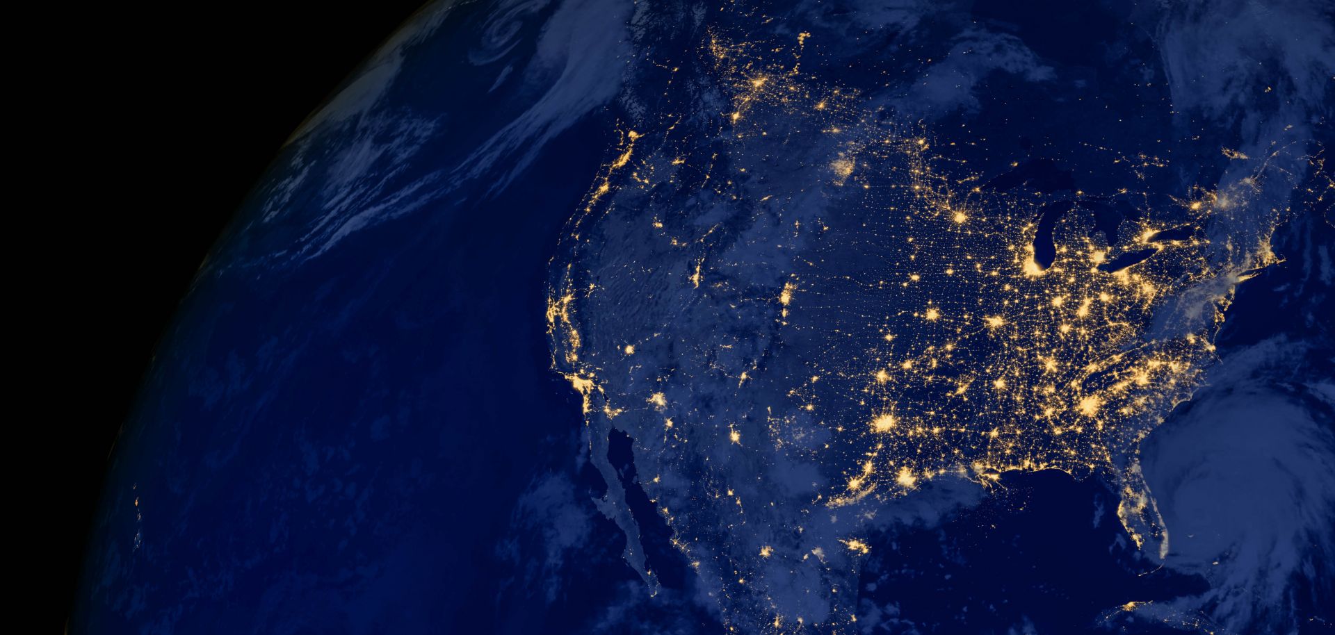 A satellite image of the United States at night. 