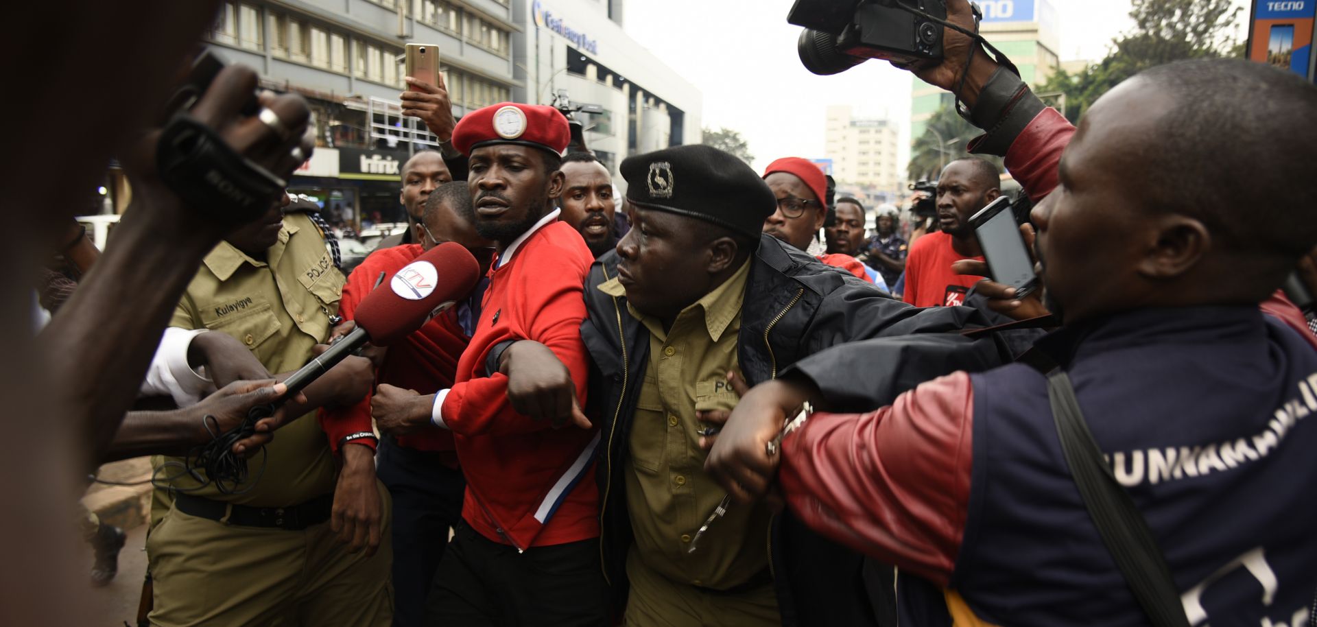 Police detain musician-turned-politician Robert Kyagulanyi Ssentamu – also known as Bobi Wine - during a demonstration on July 11, 2018, in Kampala.