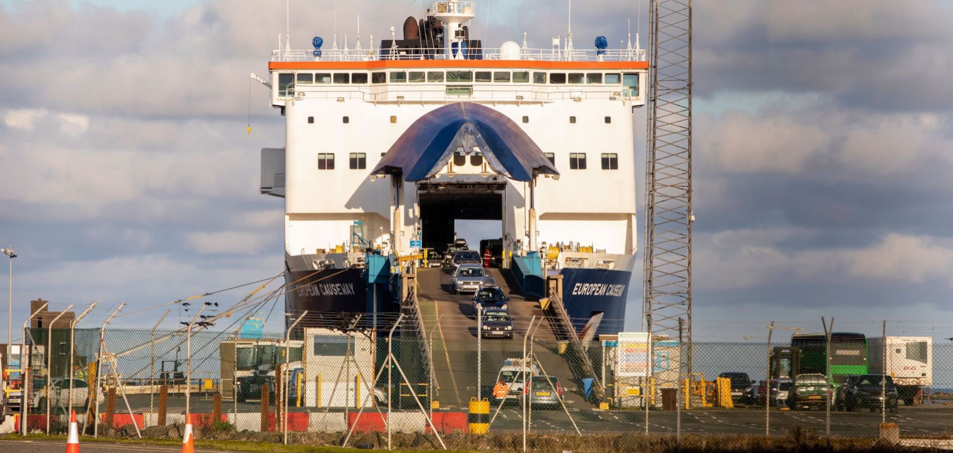 Vehicles drive off a ferry at the Port of Larne in Northern Ireland on Dec. 6, 2020. The port, which handles travel and freight from Scotland, is expected to be building a new Border Control Post (BCP) as a consequence of Brexit. 