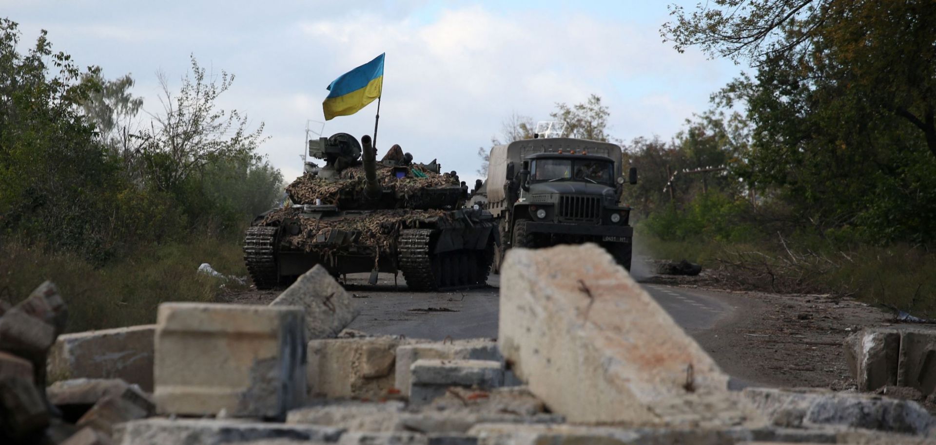 A Ukrainian tank on the road near the recently released Dolyna village in Ukraine's Donetsk region on Sept. 22, 2022.