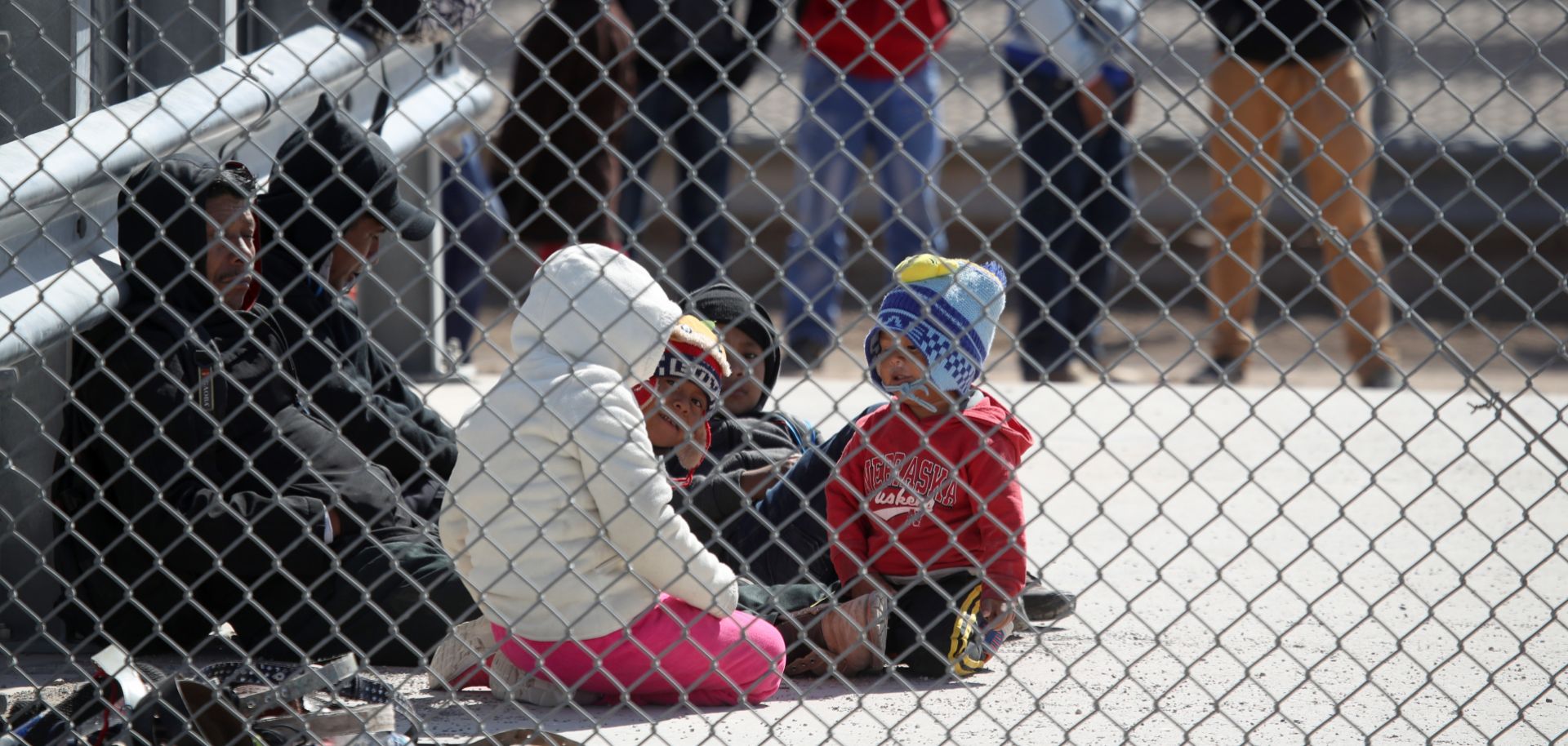 Migrants wait in a detention area on March 31, 2019, in El Paso, Texas.